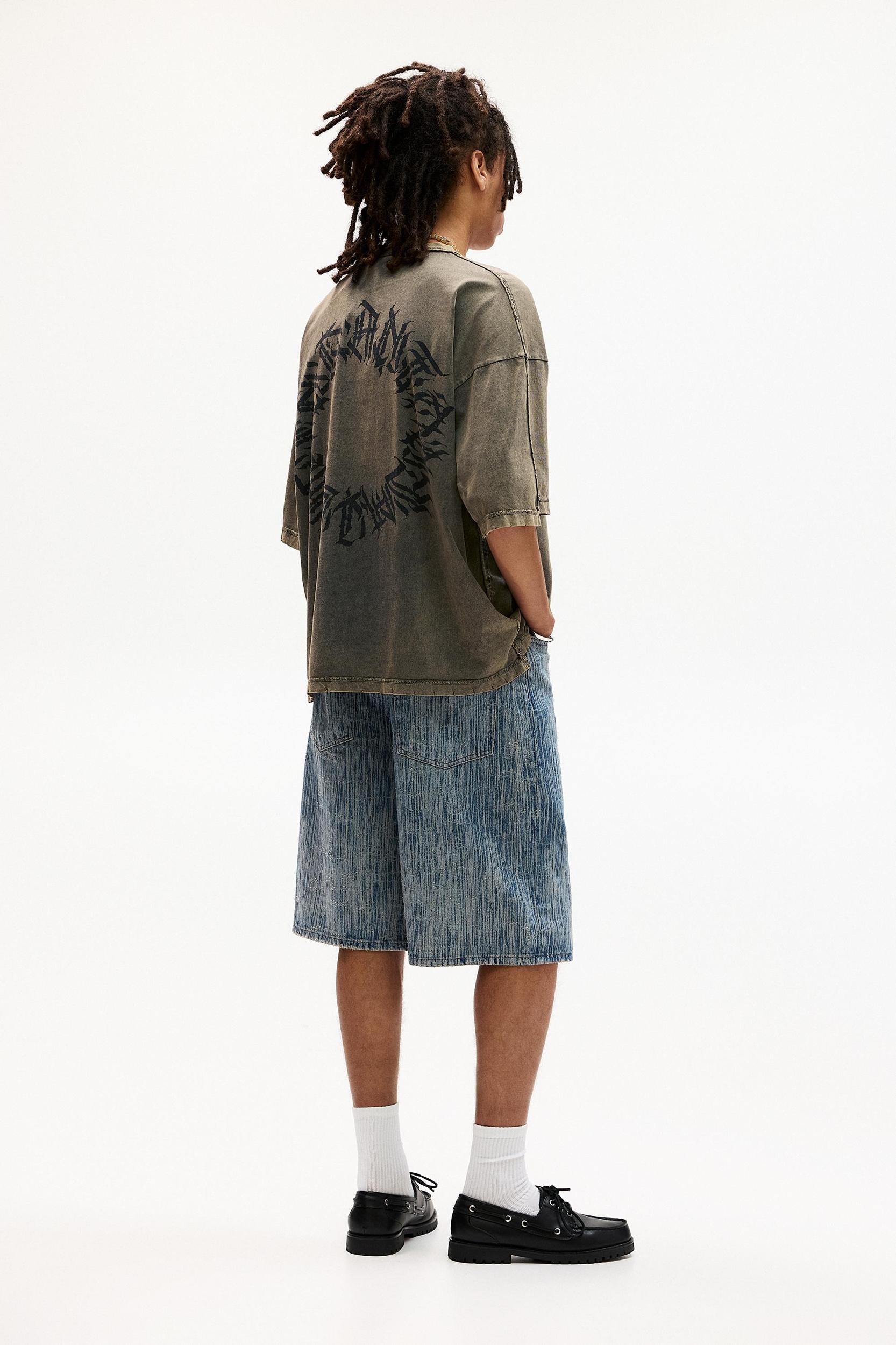 Flecked denim skater Bermuda shorts Product Image
