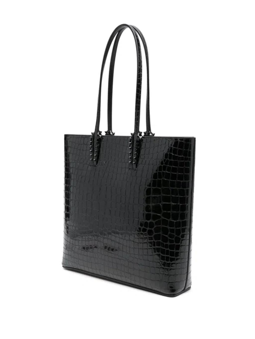 CHRISTIAN LOUBOUTIN Cabata Spiked Croc-effect Glossed-leather Tote In Black Product Image