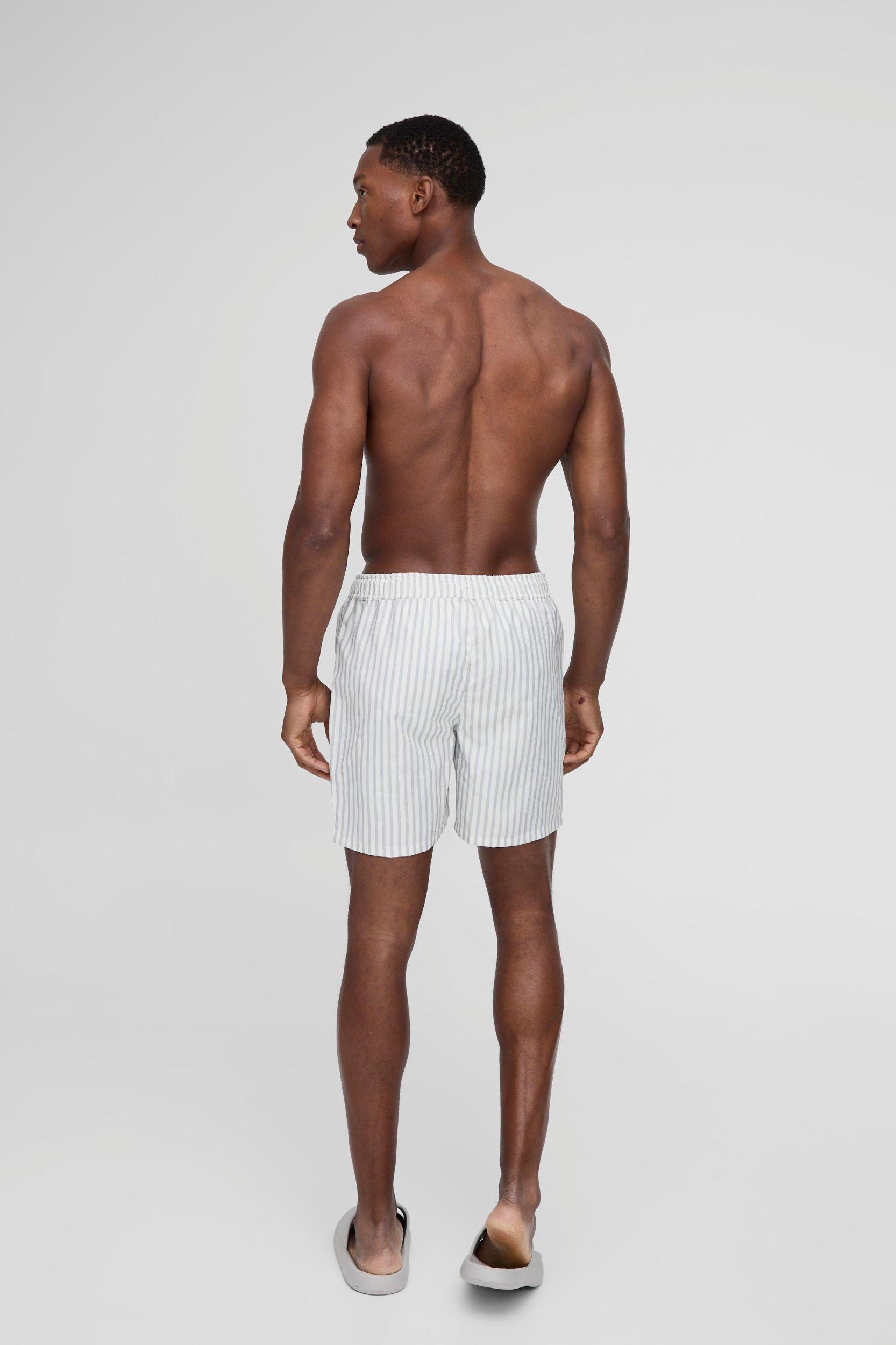 Mid Length Stripe Swim Trunks | boohooMAN USA Product Image