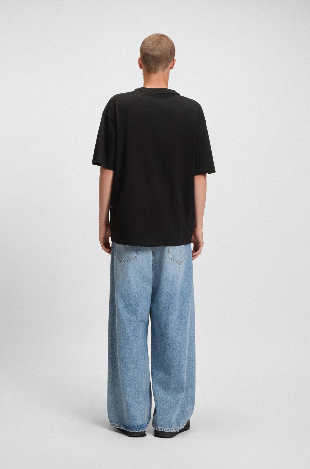 HUGO - Cotton-jersey T-shirt with logo artwork - Black Product Image