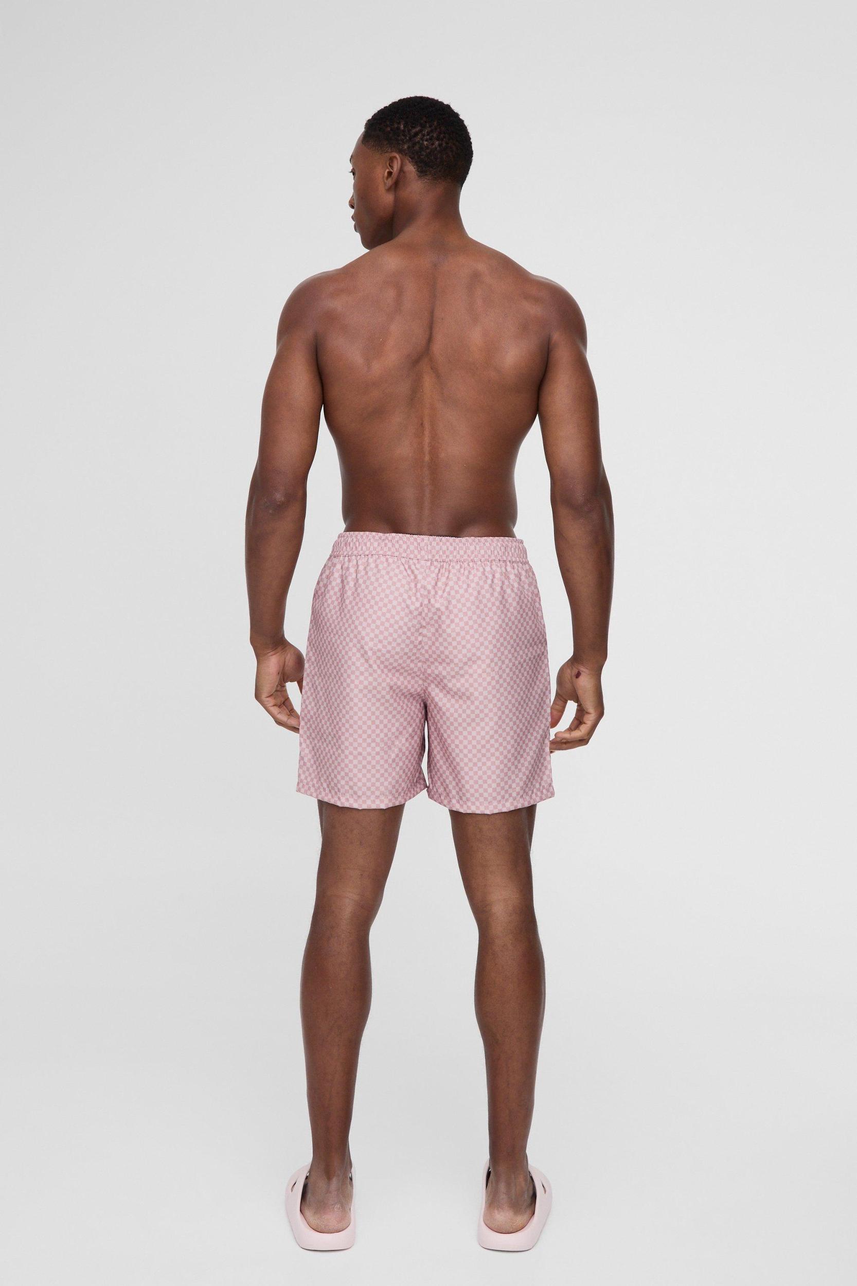 Mid Length Checkerboard Swim Trunks | boohooMAN USA Product Image