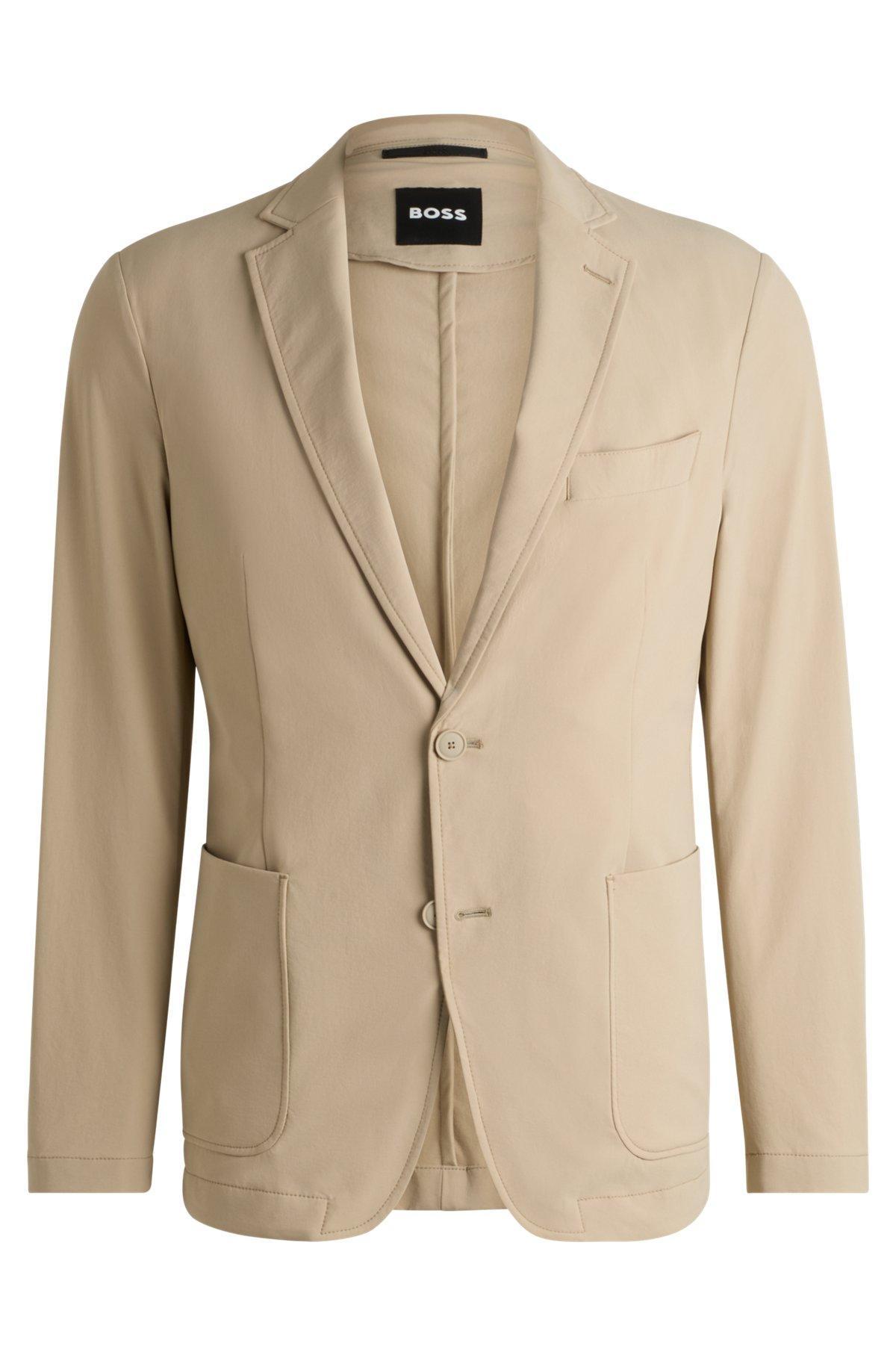 Slim-fit suit jacket in travel-friendly stretch softshell Product Image