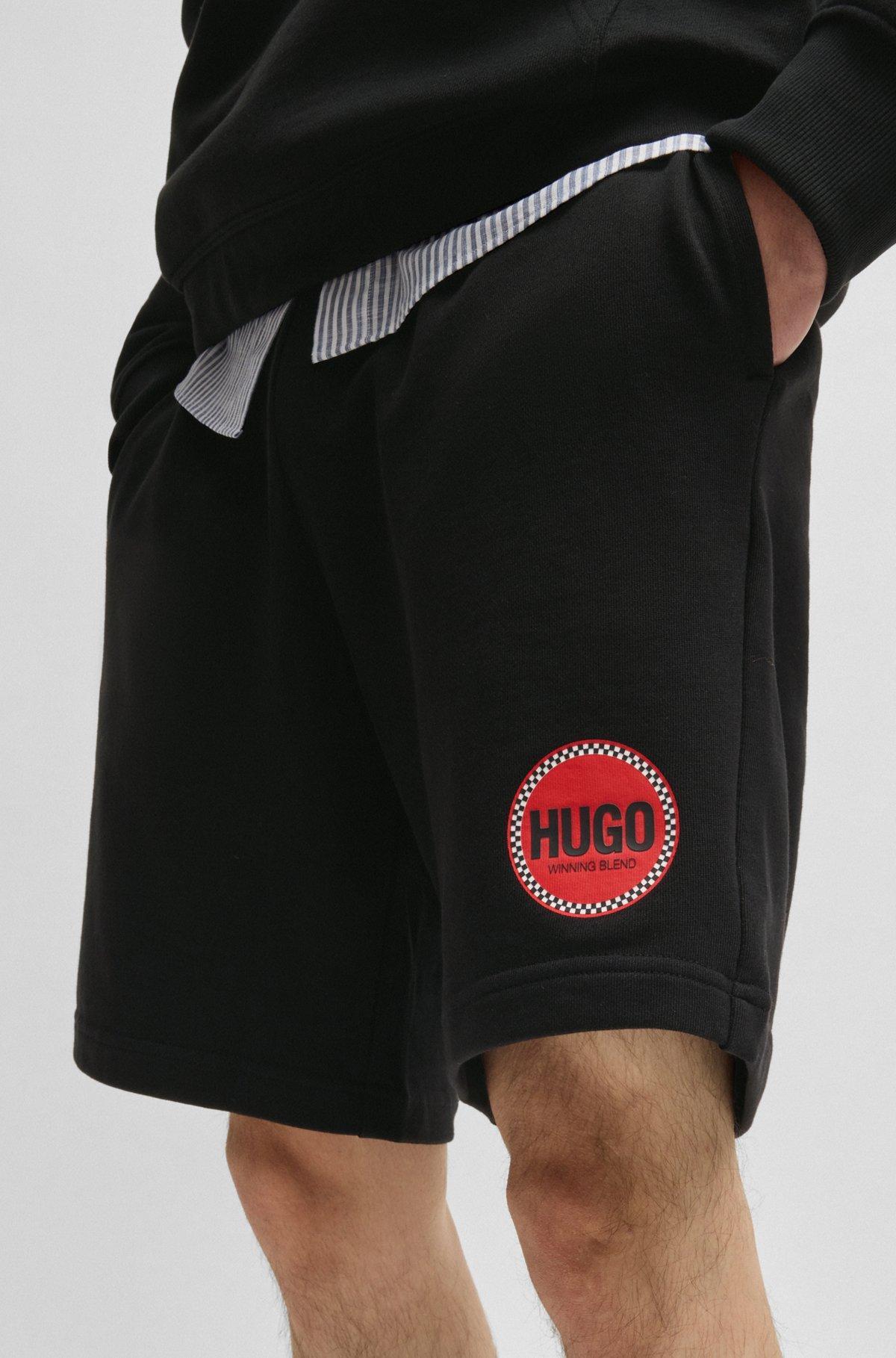 Cotton-terry relaxed-fit shorts with logo print Product Image