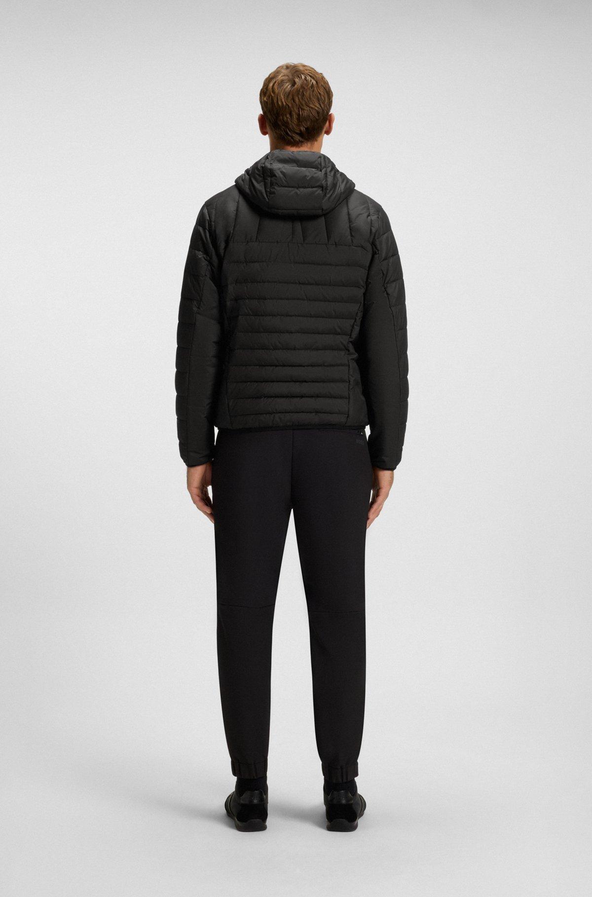 Water-repellent hooded jacket with decorative reflective details Product Image