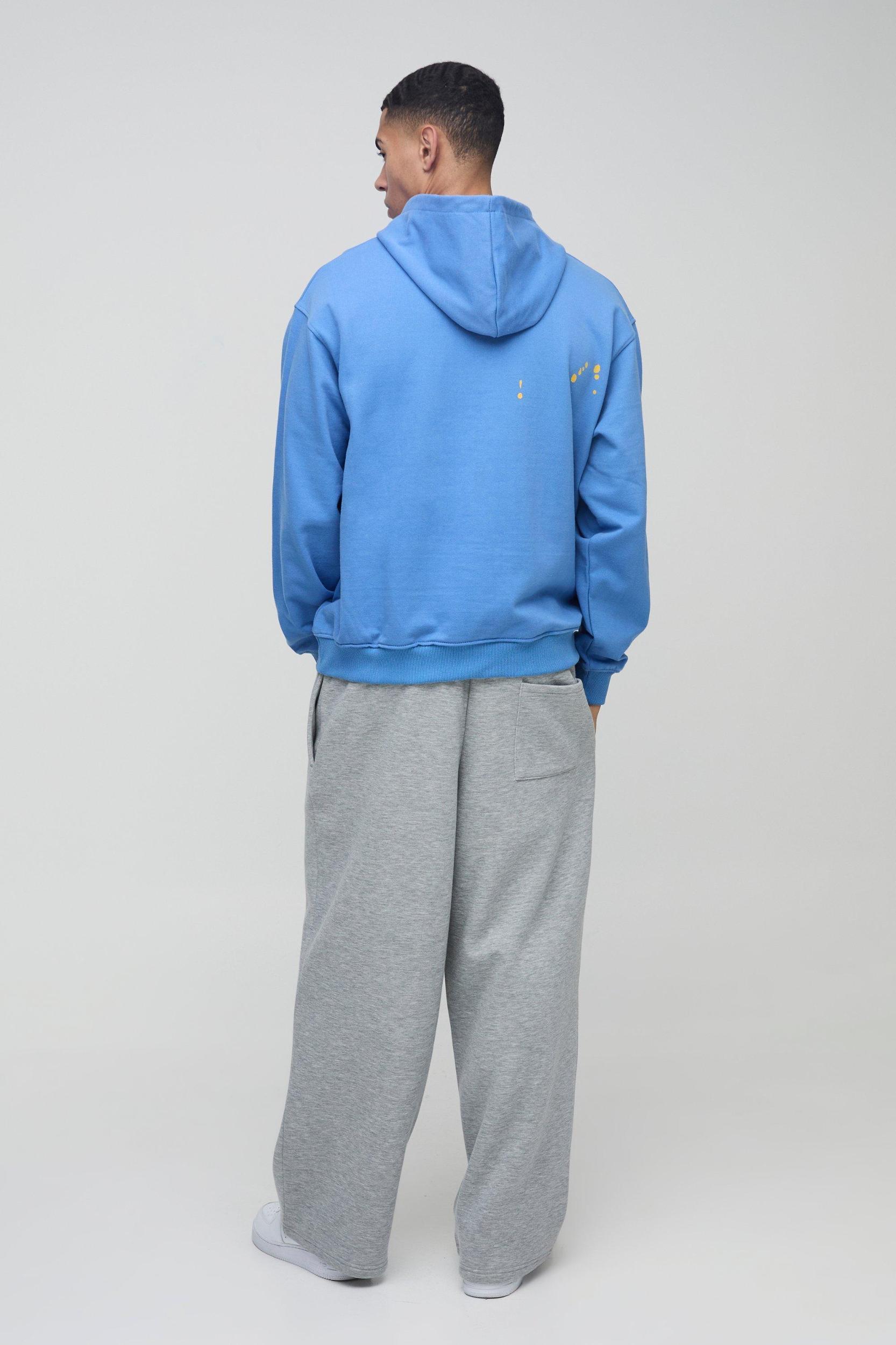 Oversized Paint Splatter Limited Edition Loopback Hoodie | boohooMAN USA Product Image