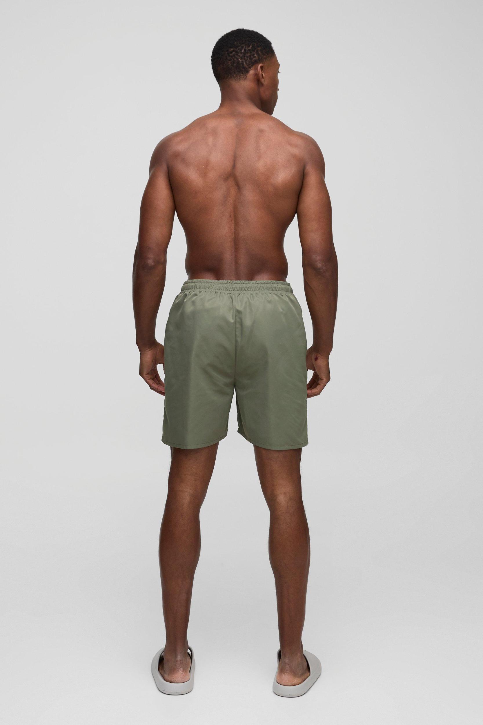 Mid Length Swim Trunks in Khaki | boohooMAN USA Product Image