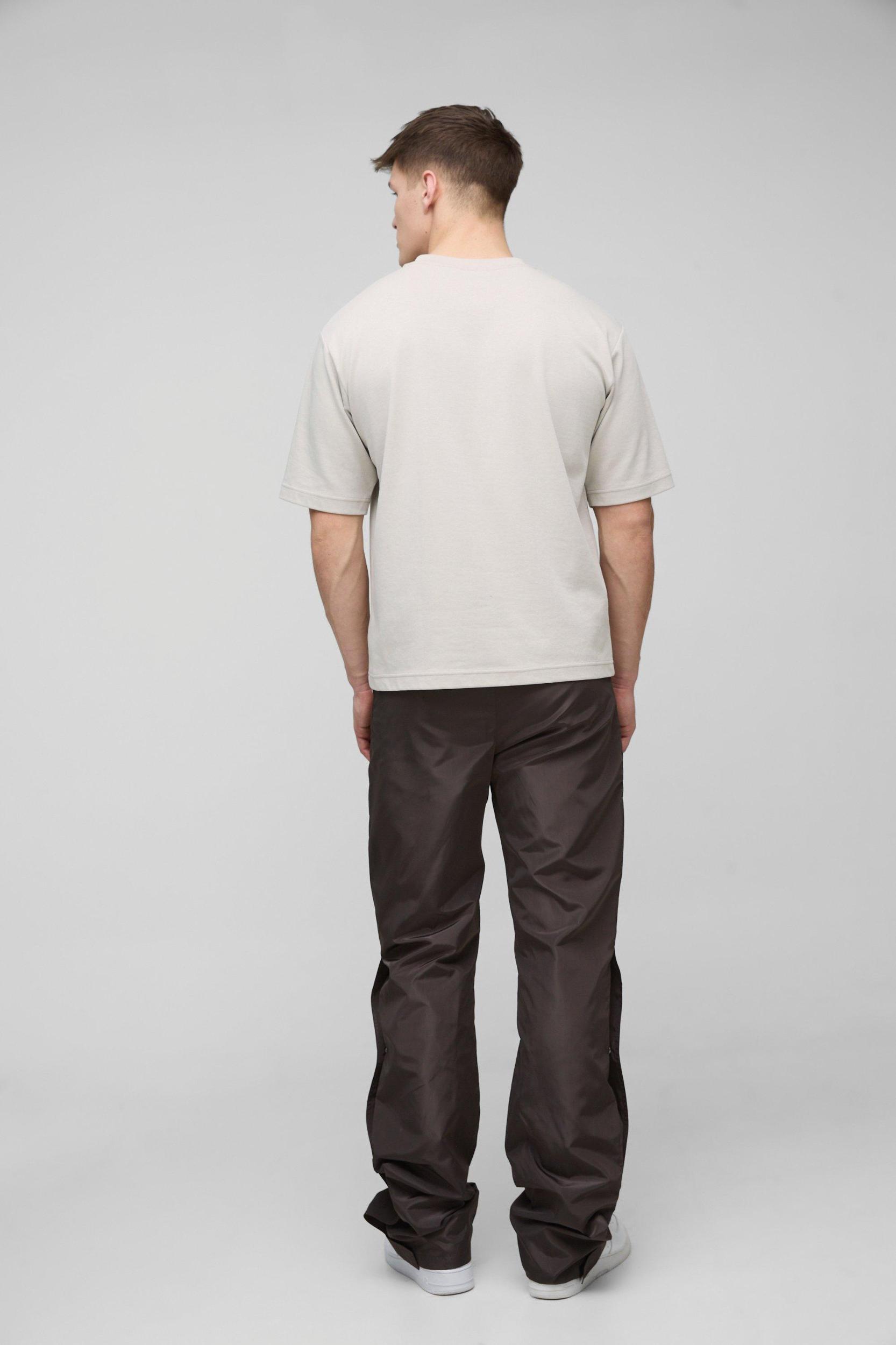 Tall Elasticated Waist Slim Flare Stacked Cargo Pants | boohooMAN USA Product Image