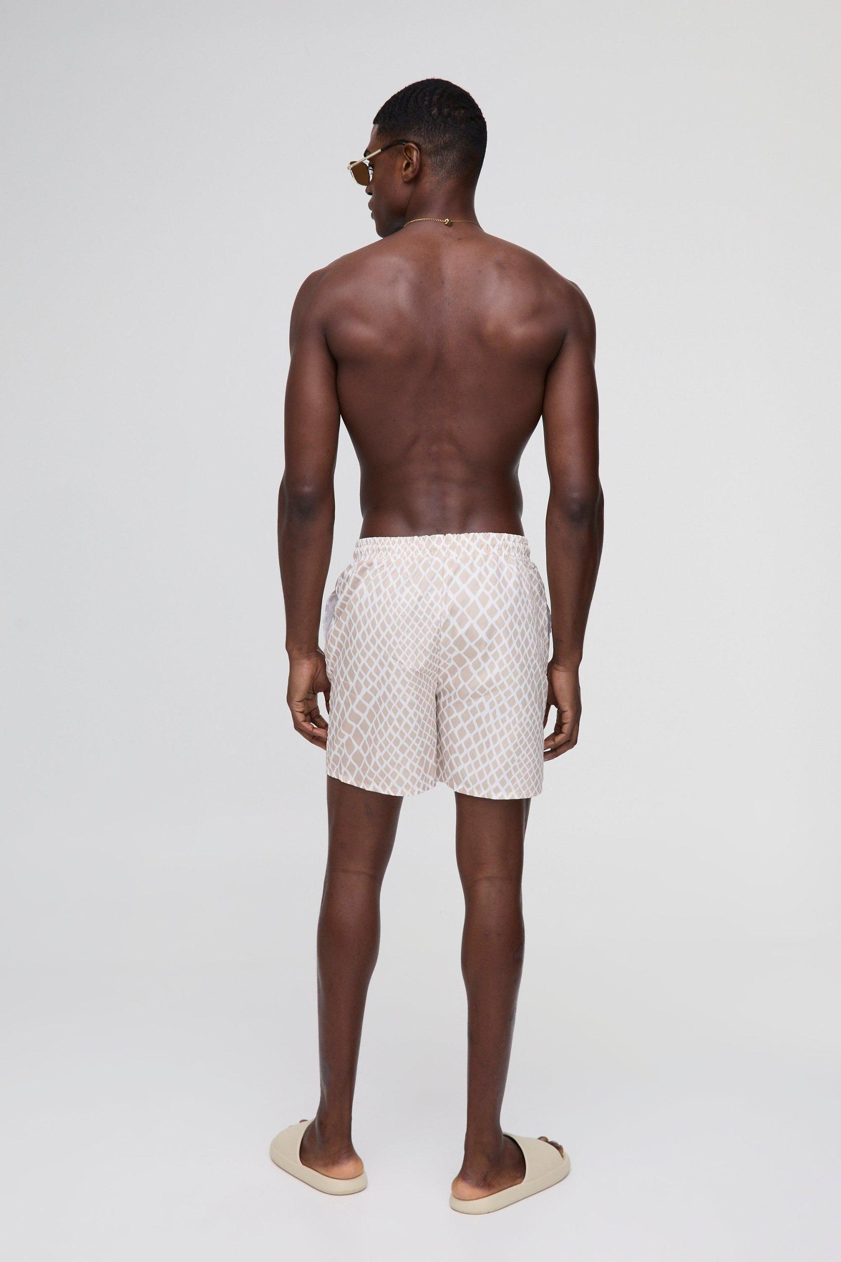 Regular Abstract Animal Print Swim Trunks | boohooMAN USA Product Image