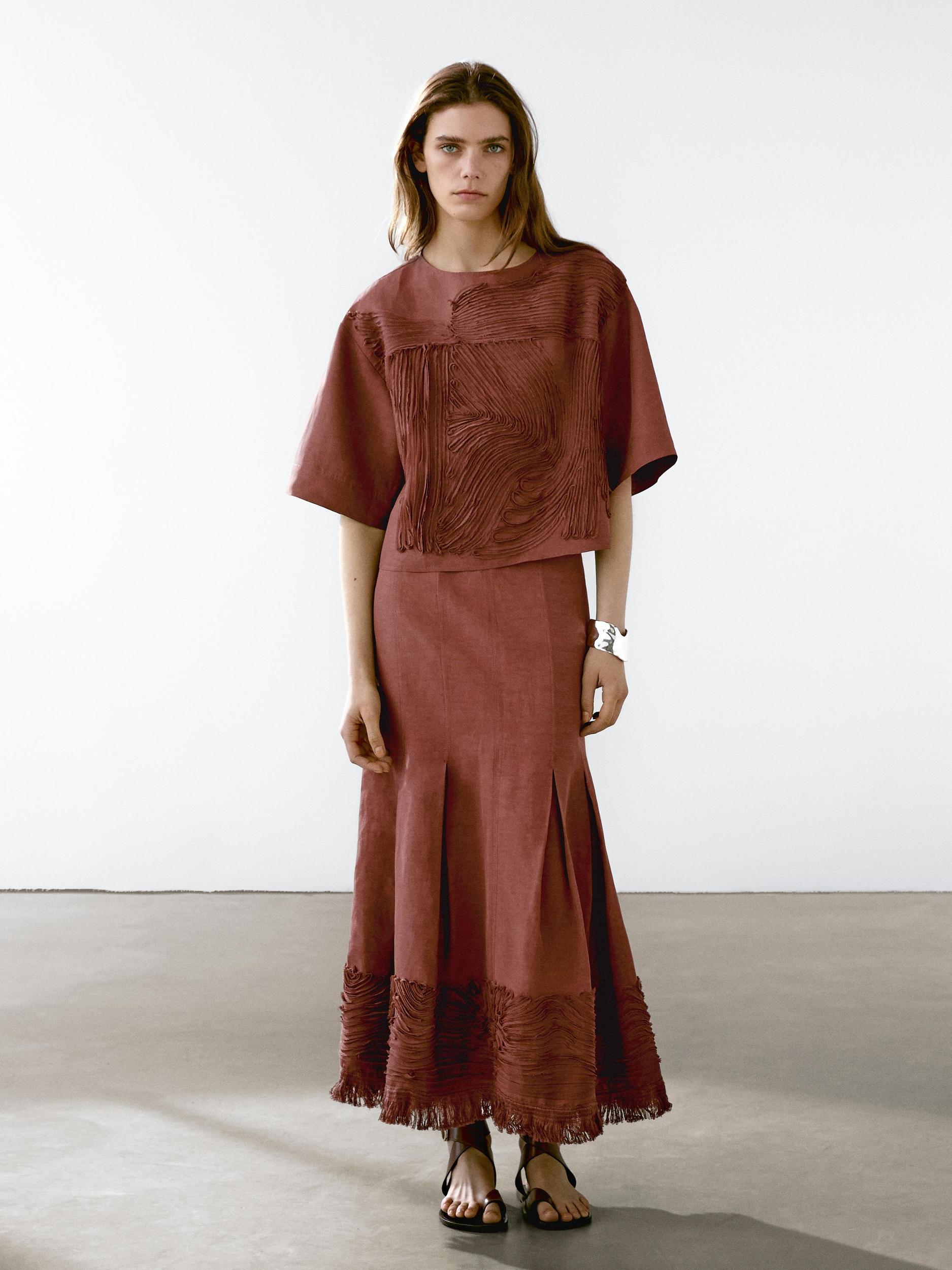 Flowing top with embroidered detail Product Image