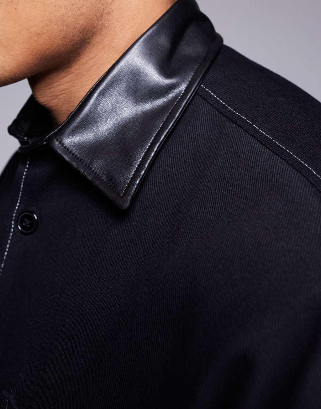 ASOS DESIGN oversized boxy overshirt with faux leather collar in black Product Image