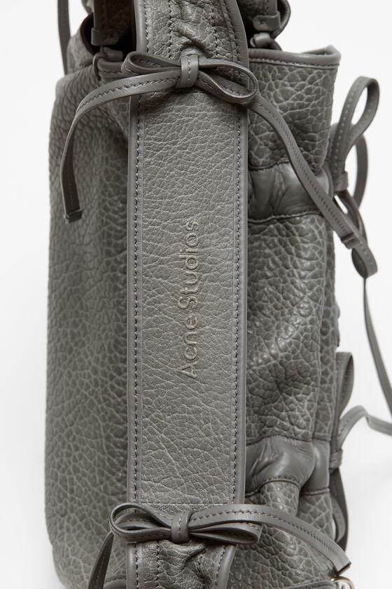 Multipocket grained leather bag Product Image