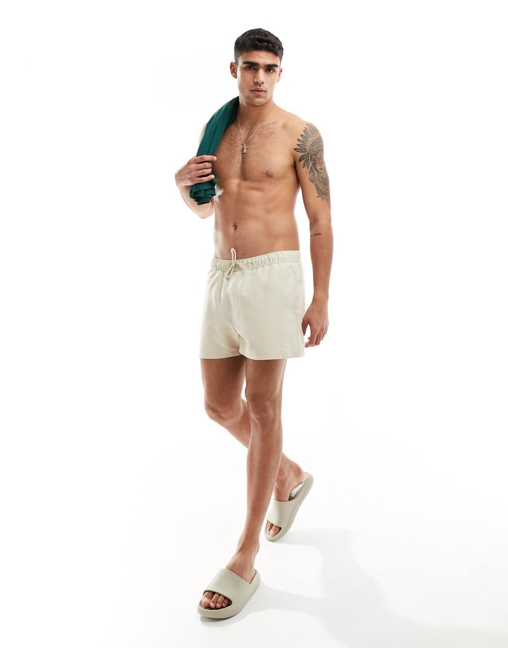 ASOS DESIGN swim shorts in short length in stone  Product Image