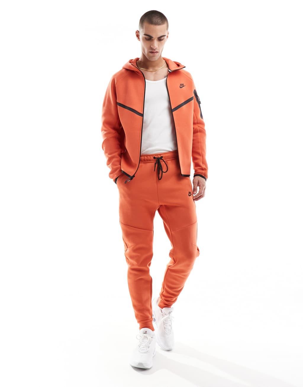 Nike Tech Fleece full zip hoodie in orange Product Image