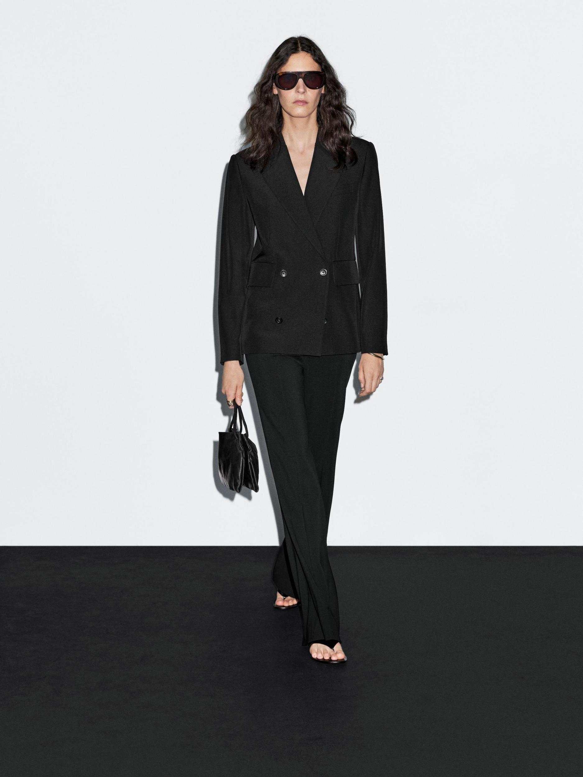 Flared trousers with pocket Product Image