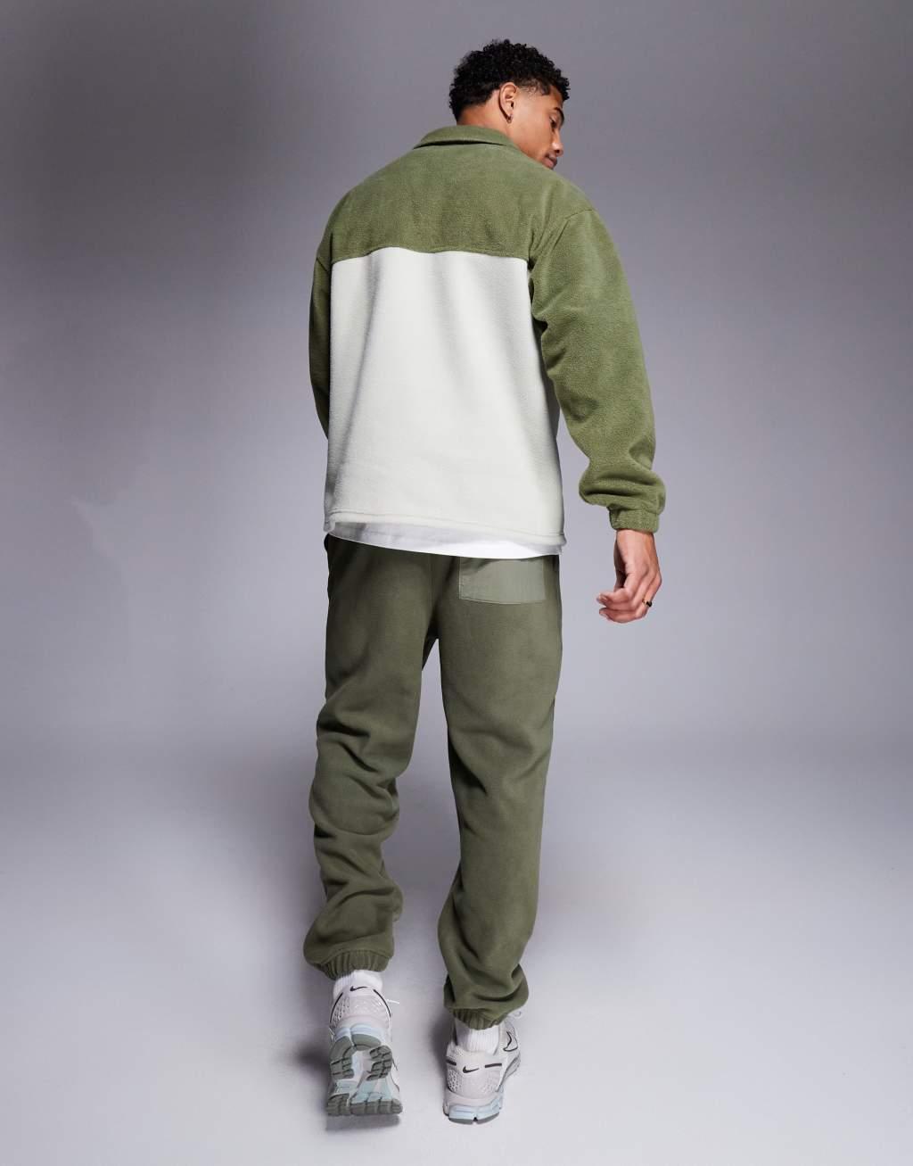 ASOS DESIGN tapered fleece sweatpants in khaki Product Image