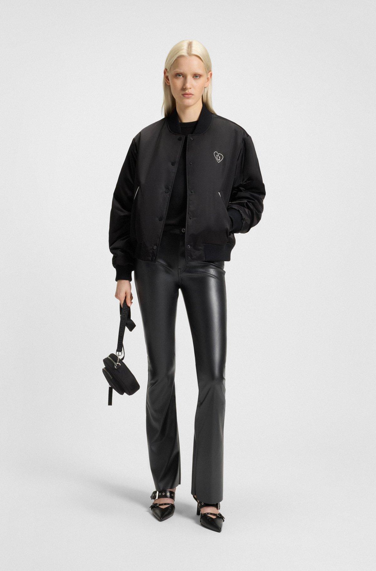 Faux-leather trousers with flared leg Product Image