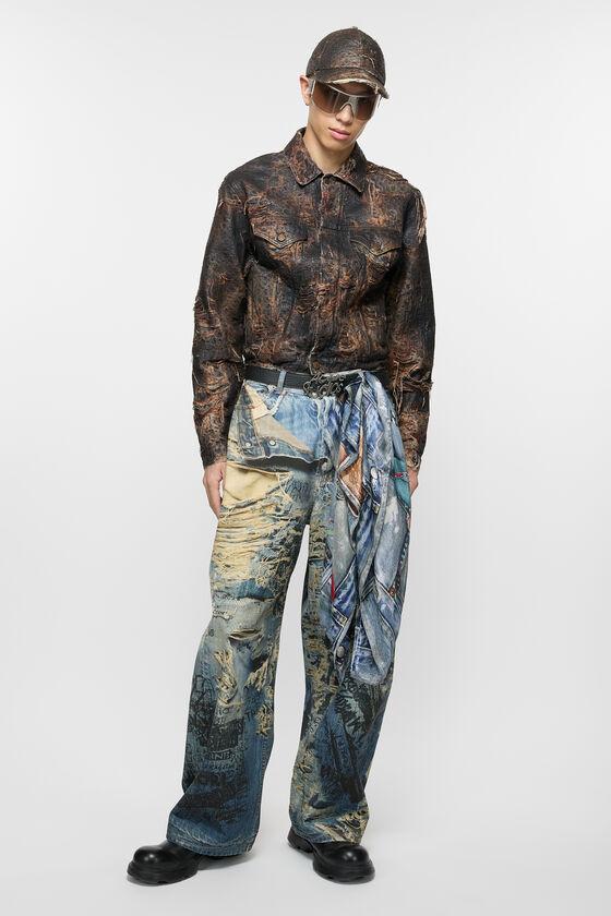 Distressed monogram denim jacket - Regular fit Product Image