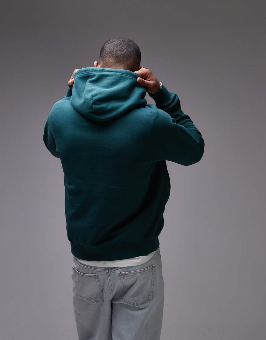 Tommy Jeans varsity patch hoodie in forest green Product Image