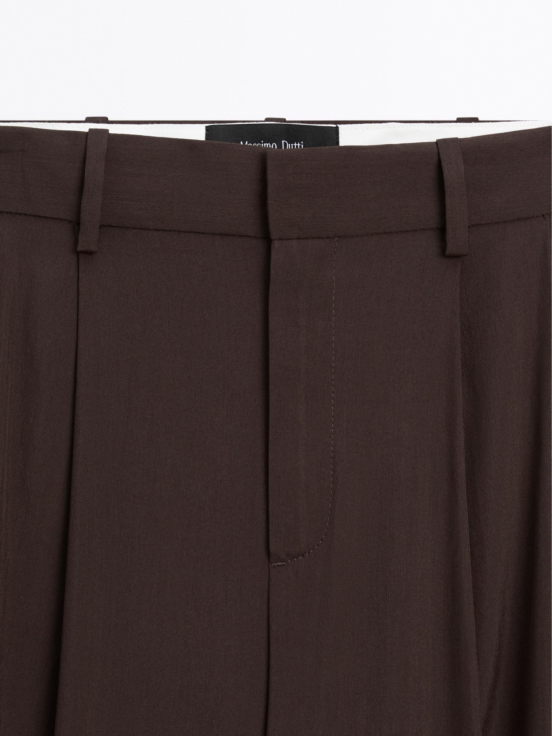 Flowing trousers with darts Product Image