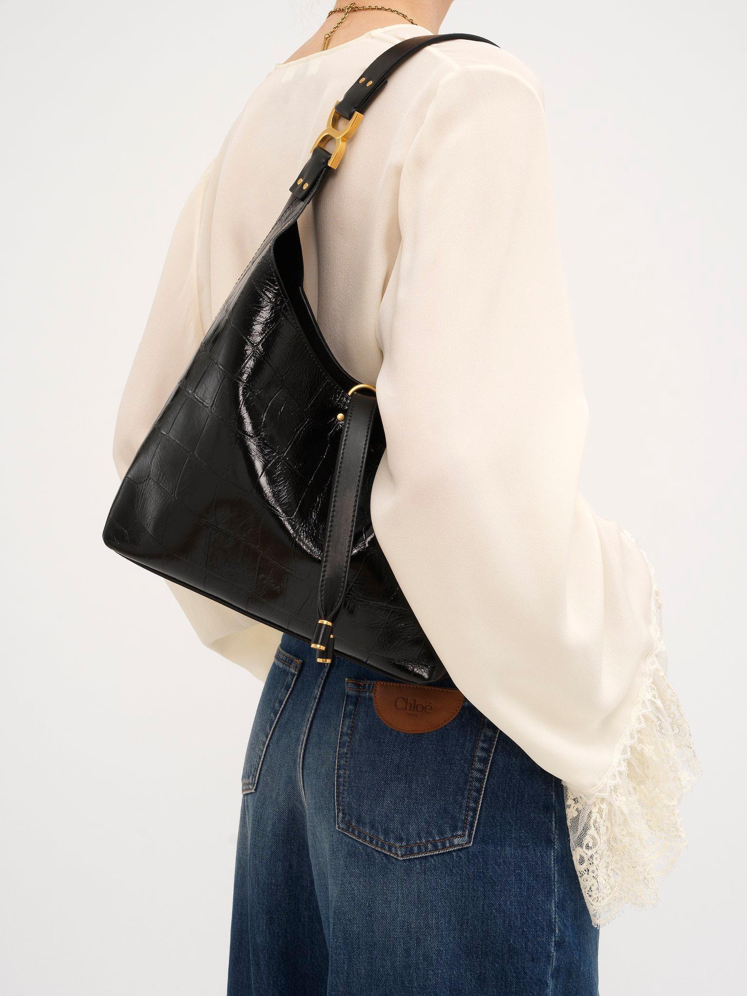 Small Marcie hobo bag in croco-effect leather Product Image