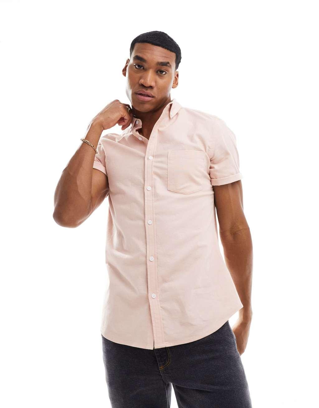 ASOS DESIGN short sleeve slim fit oxford shirt in light pink Product Image