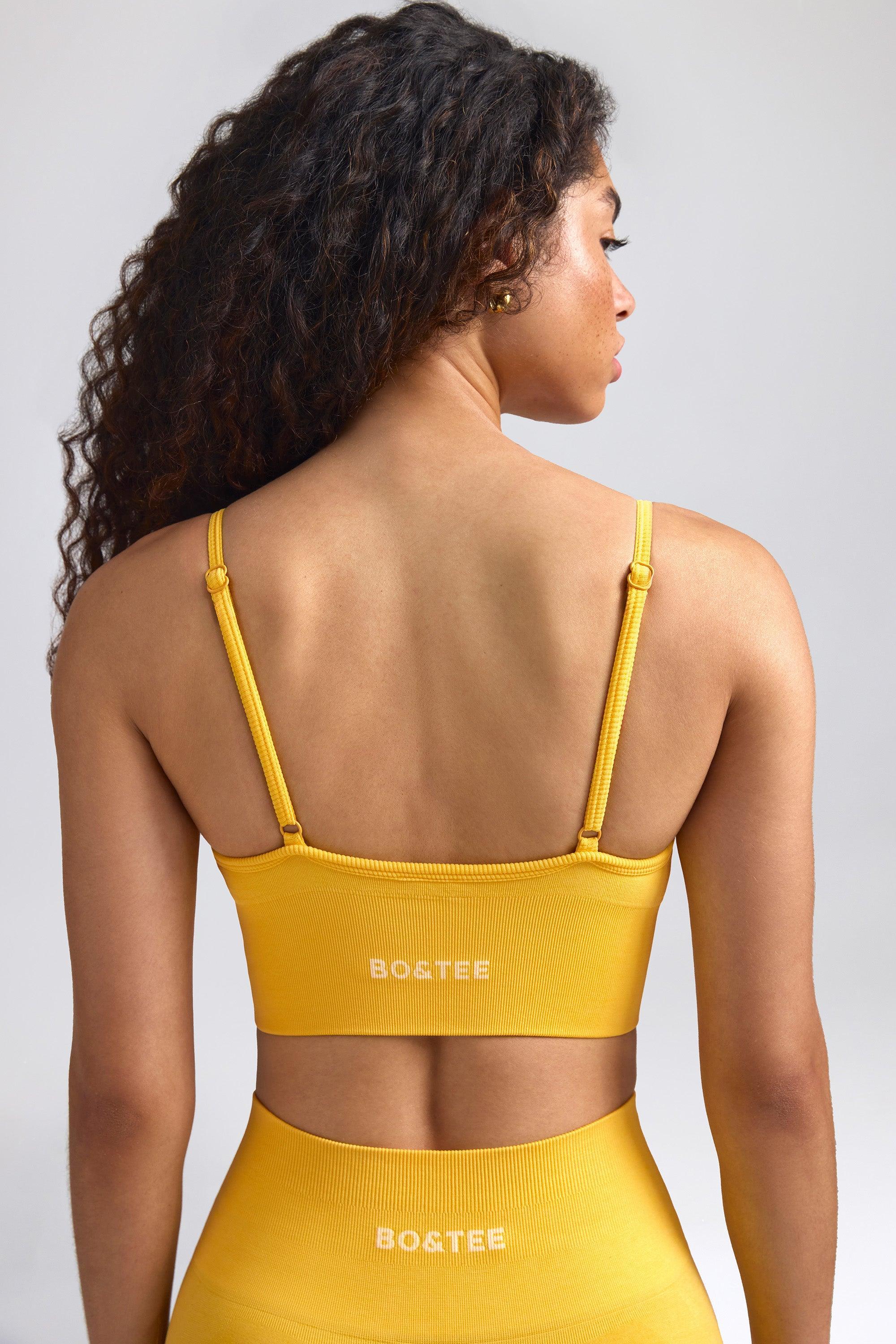 Define Luxe V-Neck Sports Bra in Golden Yellow Female Product Image