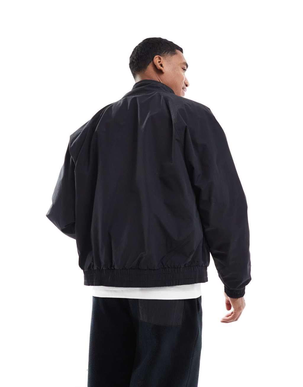 Nike Club Futura jacket in black Product Image