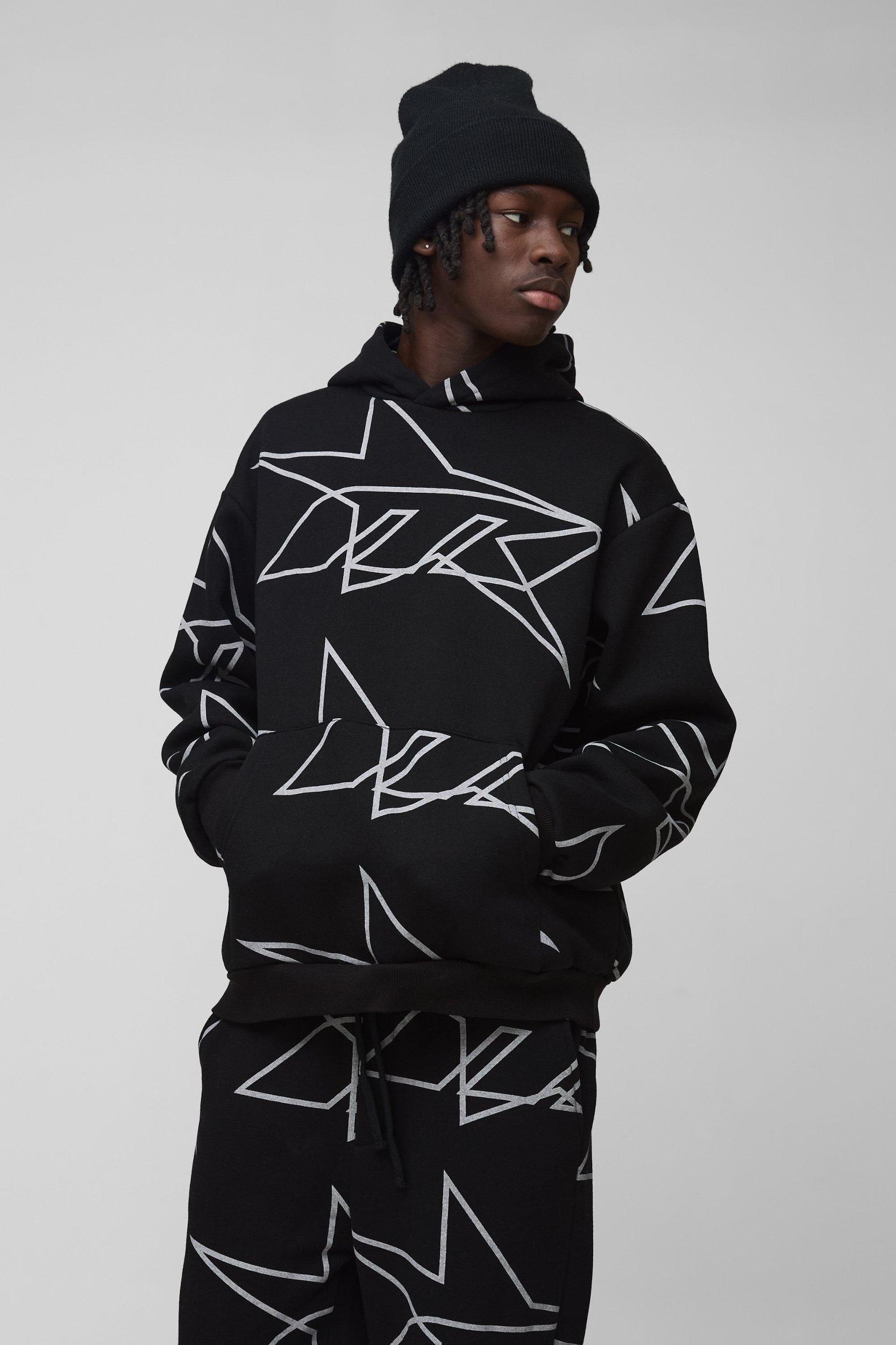 Oversized Star All Over Printed Gusset Flare Hooded Tracksuit | boohooMAN USA Product Image