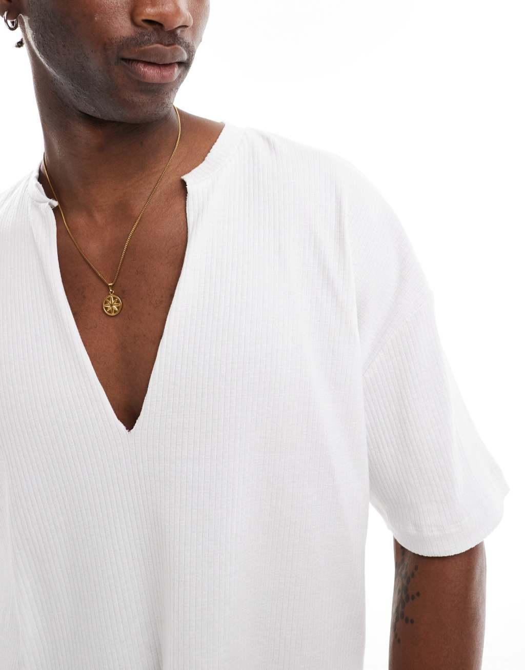 ASOS DESIGN oversized boxy ribbed T-shirt with deep cut V-neck in white Product Image