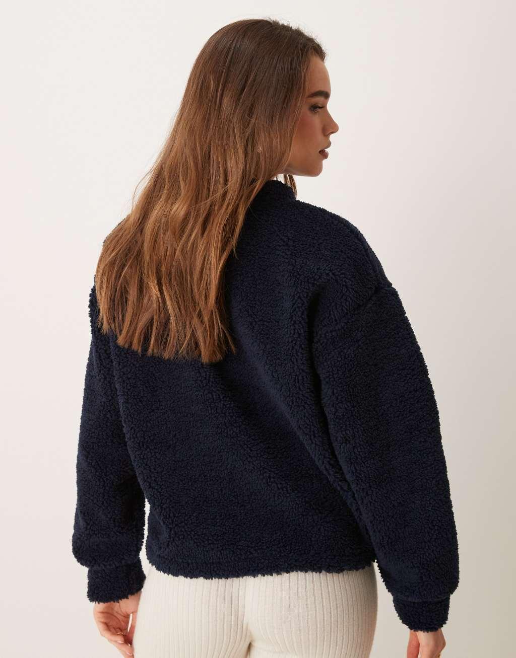 ASOS DESIGN ski club embroidered oversized teddy sweatshirt in navy Product Image