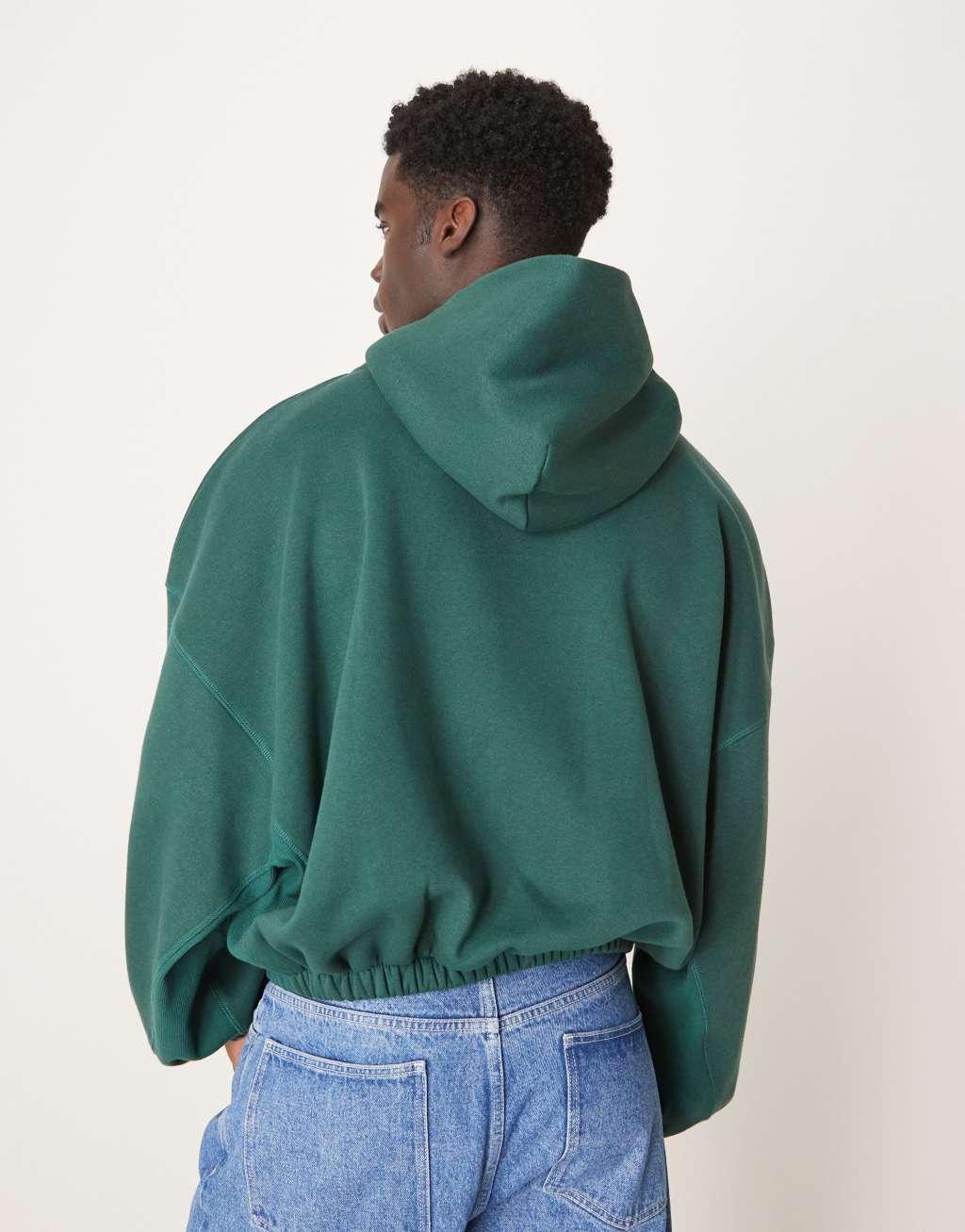 ASOS DESIGN extreme oversized boxy hoodie with underarm panels in dark green Product Image