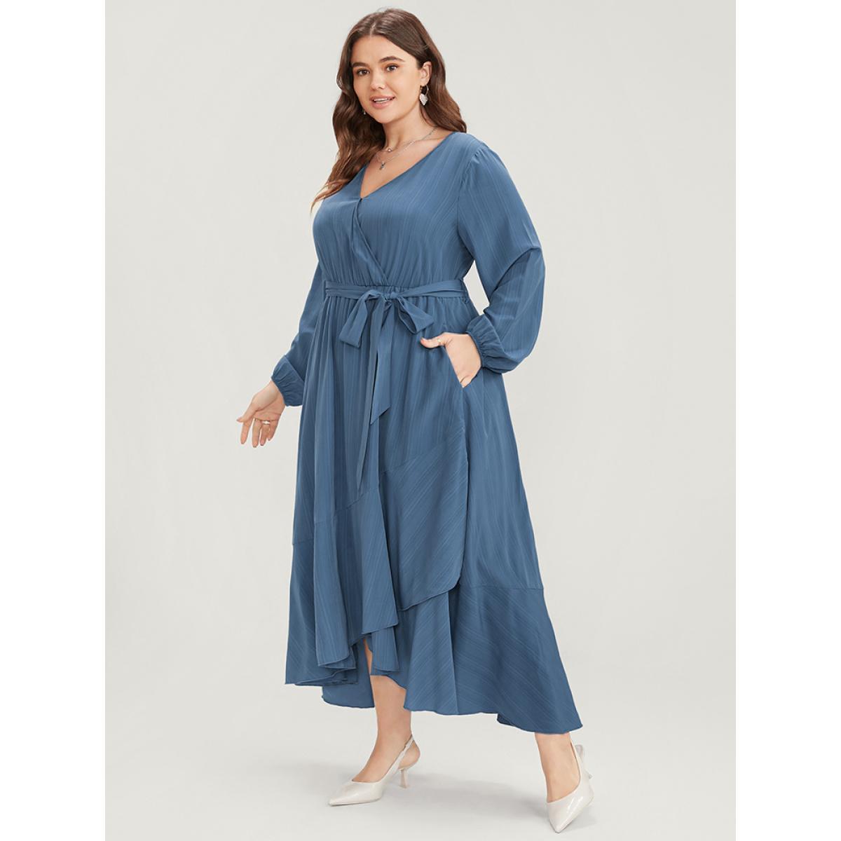 Plus Size Solid Surplice Neck Lantern Sleeve Pocket Belted Asymmetrical Hem Dress Cerulean Women Elegant Asymmetrical V-neck Long Sleeve Curvy Midi Dress BloomChic 30/6X Product Image