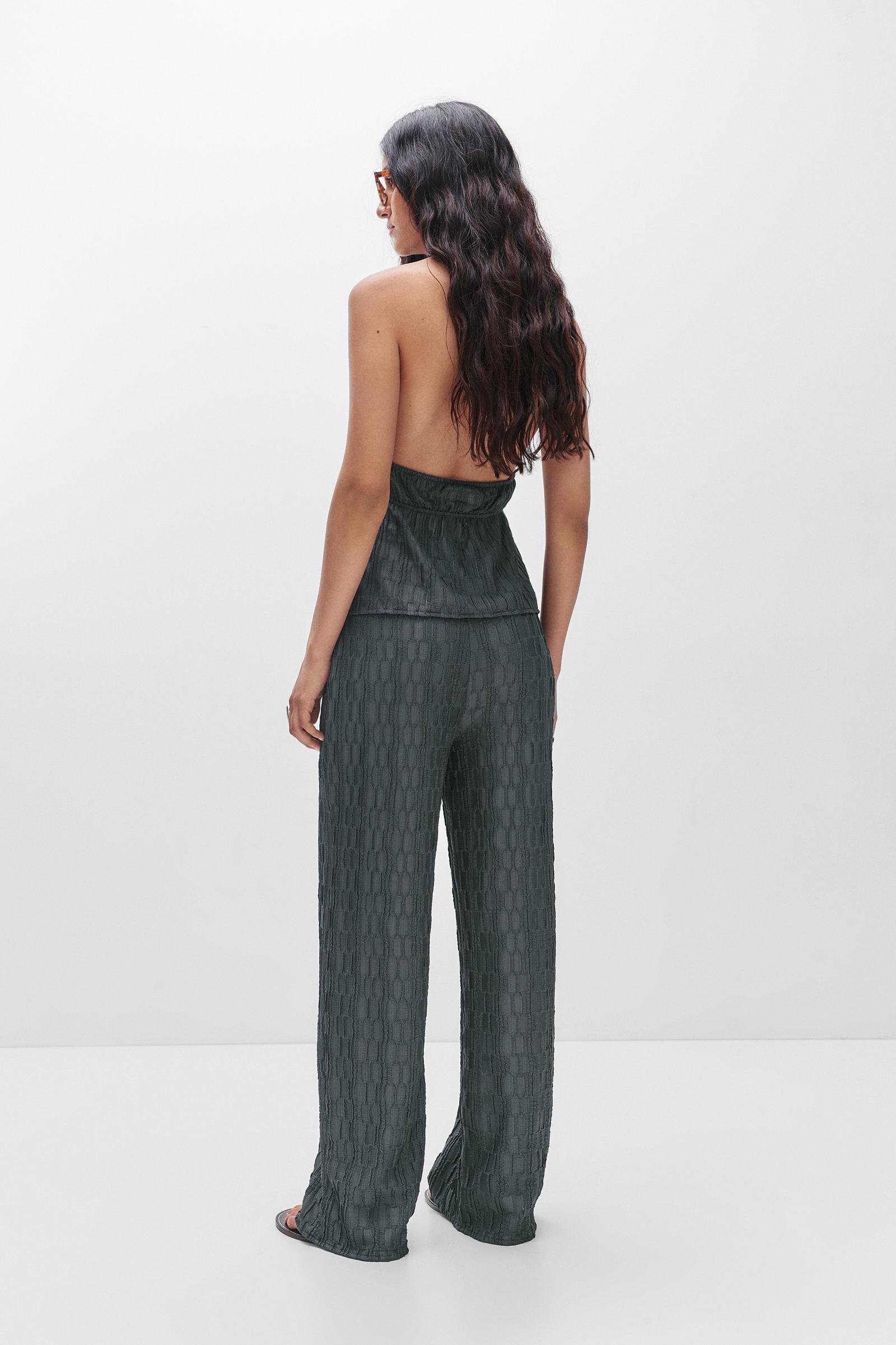 Textured bell bottom trousers Product Image