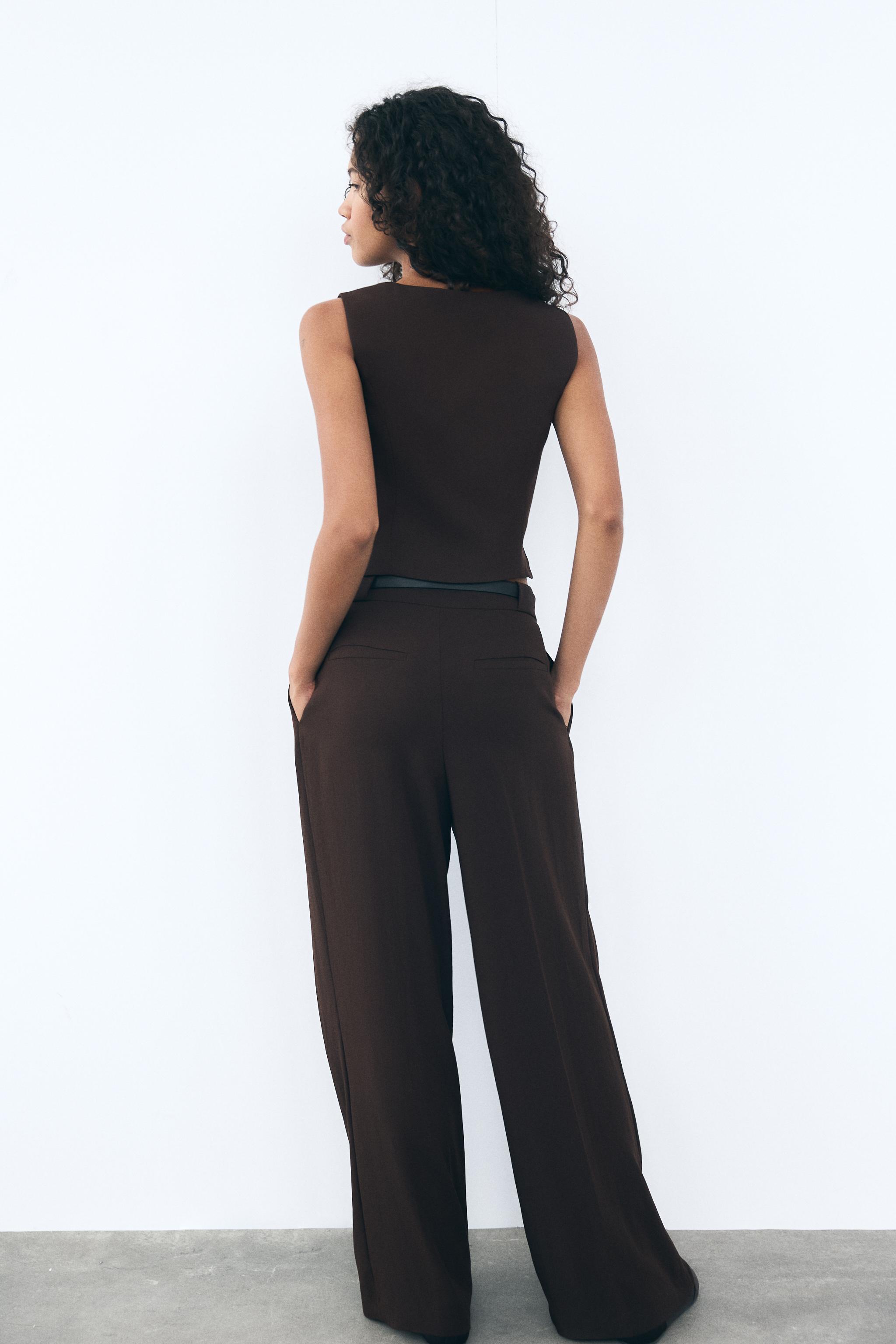 PLEATED PANTS WITH BELT Product Image