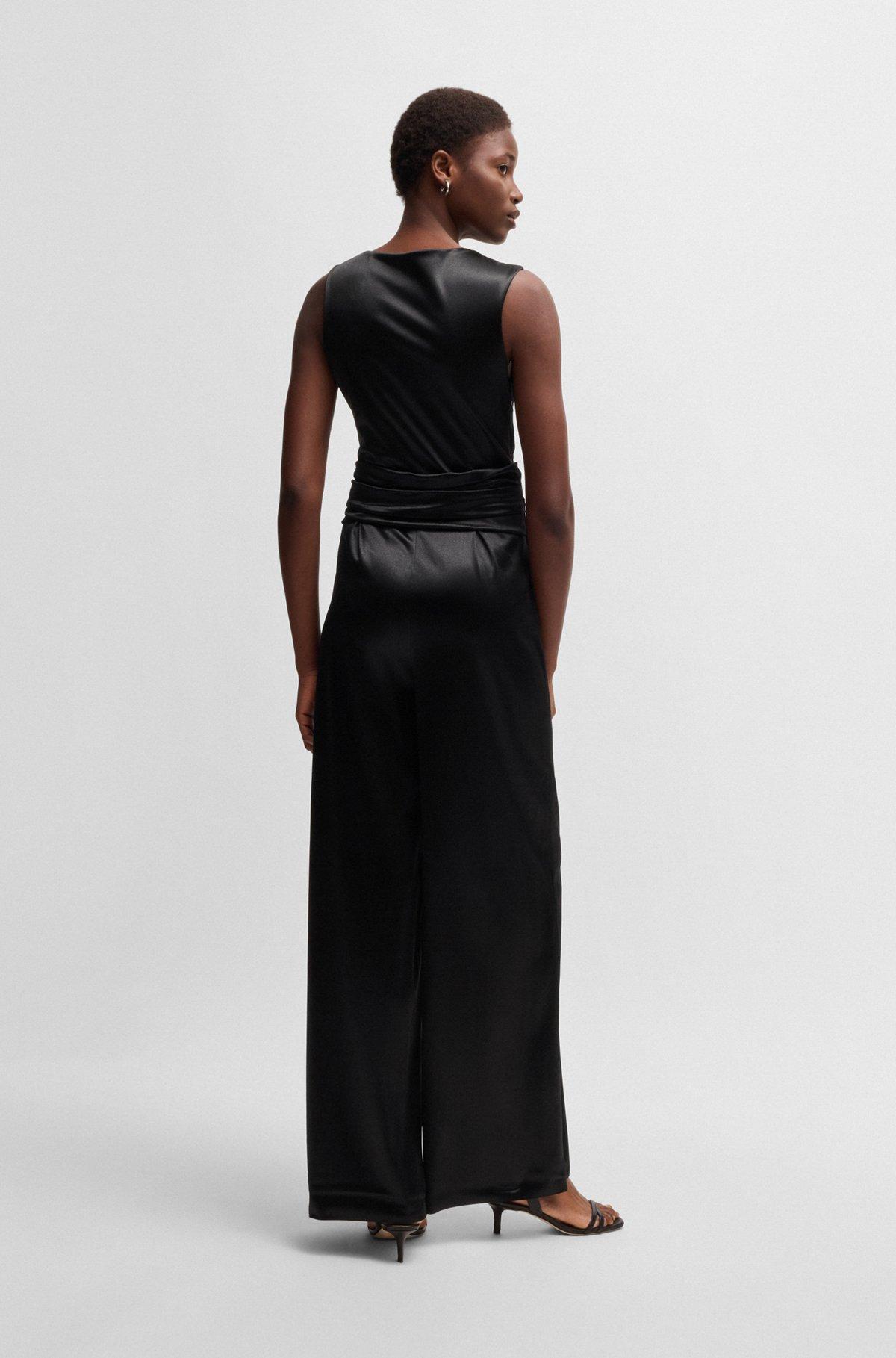 Sleeveless jumpsuit in lustrous jersey with wrap front Product Image