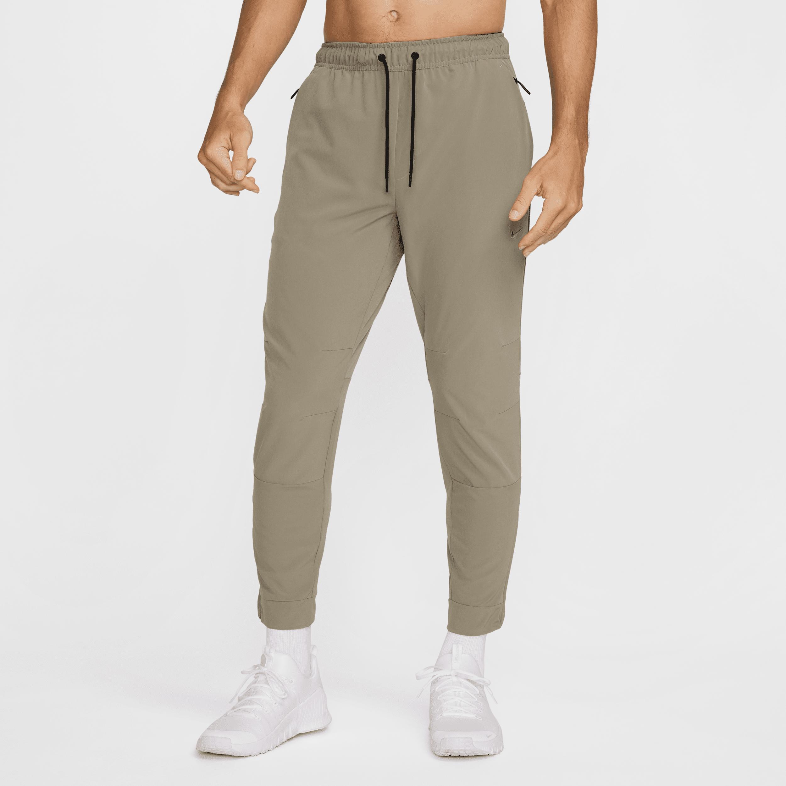 Nike Men's Unlimited Dri-FIT Zippered Cuff Versatile Pants Product Image