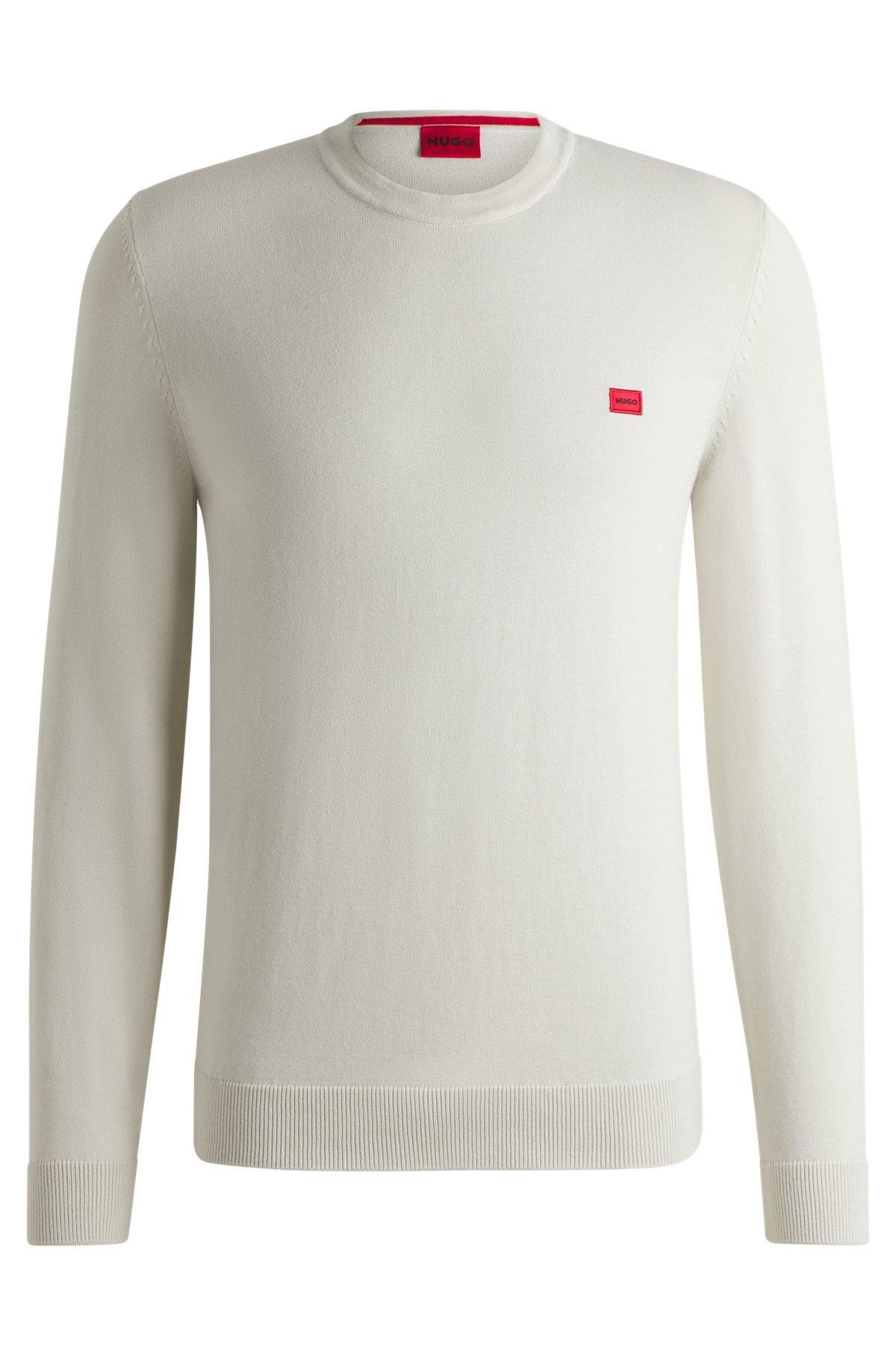 Cotton sweater with red logo label Product Image