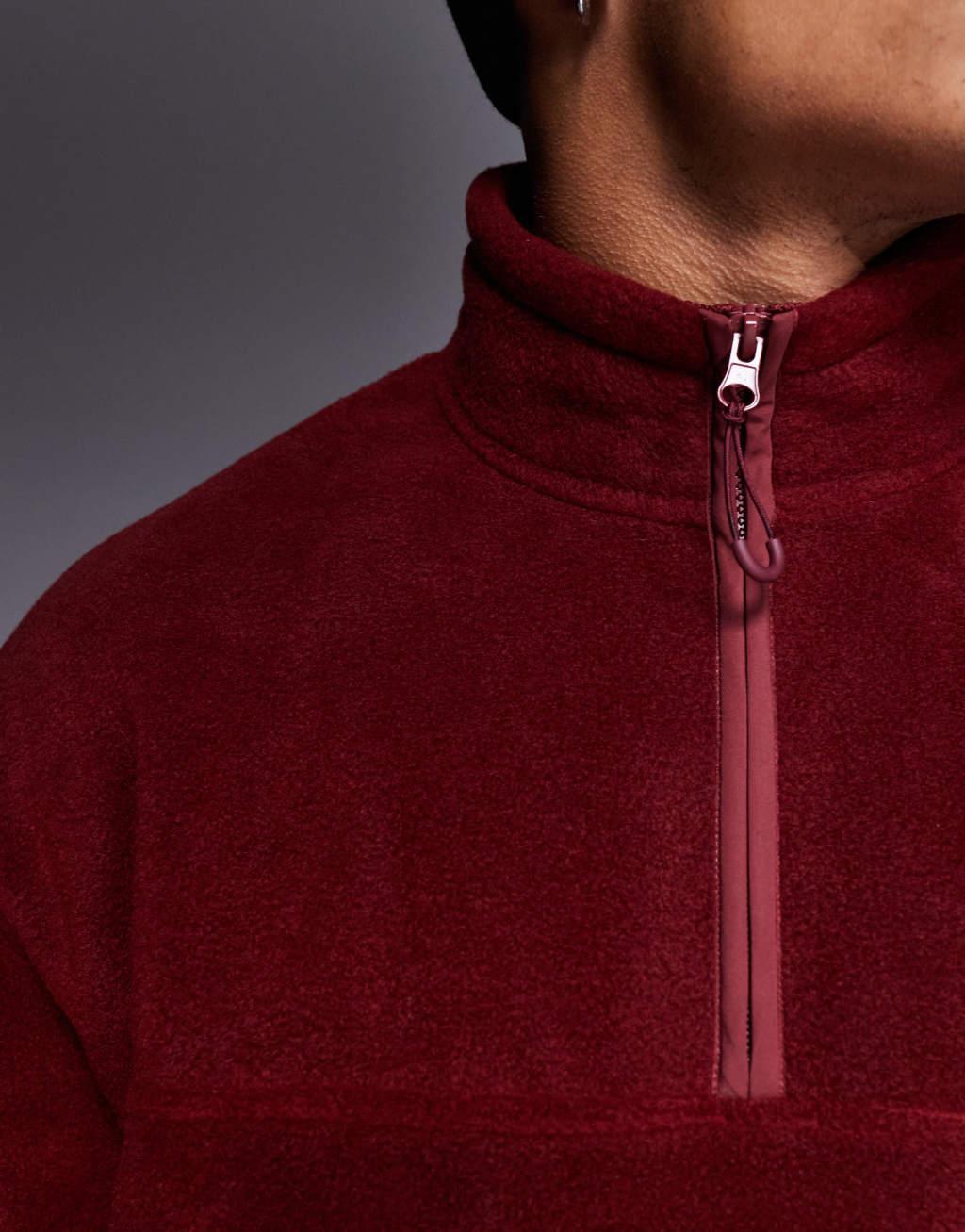 ASOS DESIGN oversized half zip fleece sweatshirt in burgundy Product Image