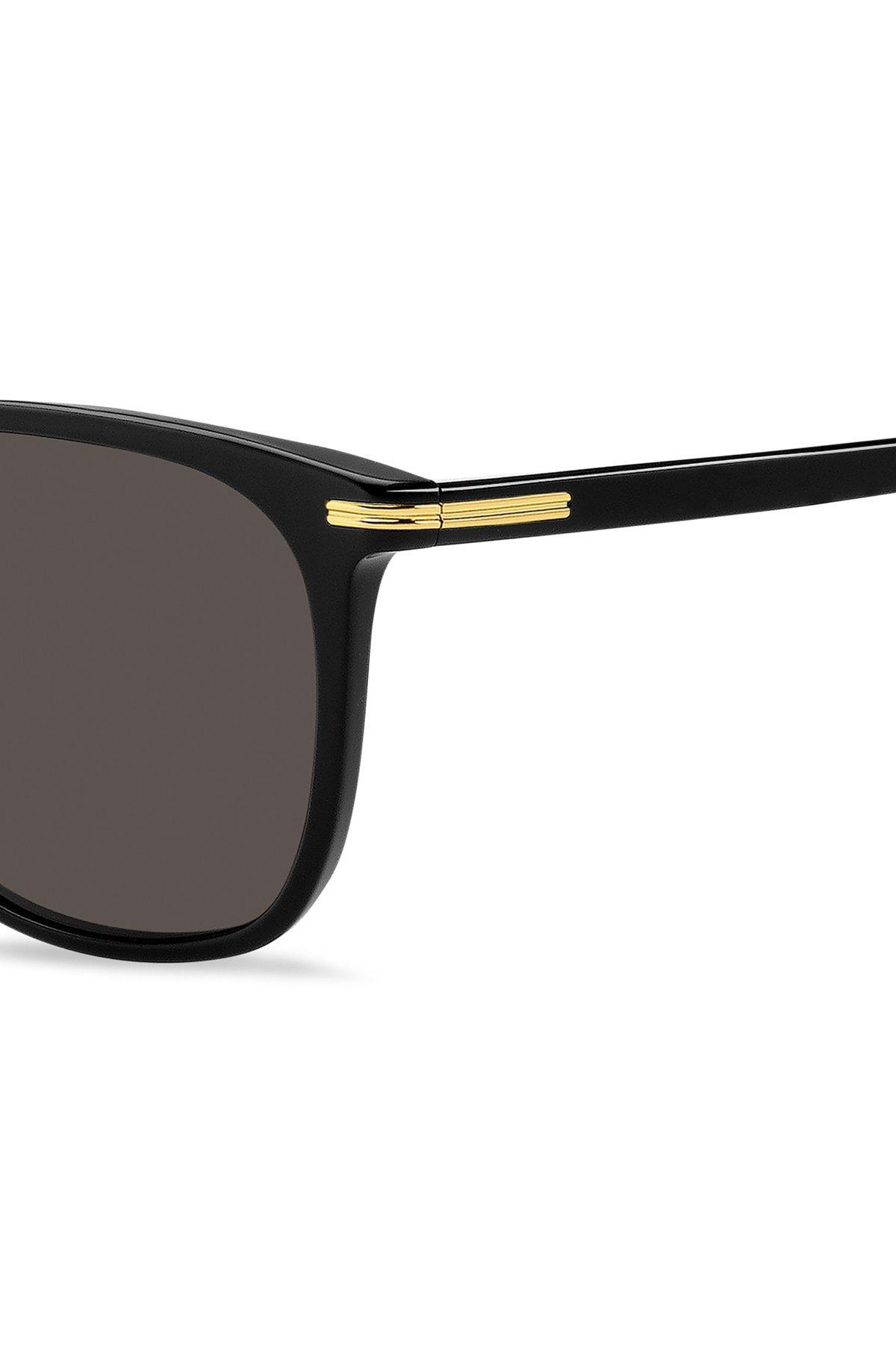 Black-acetate sunglasses with gold-tone trims Product Image