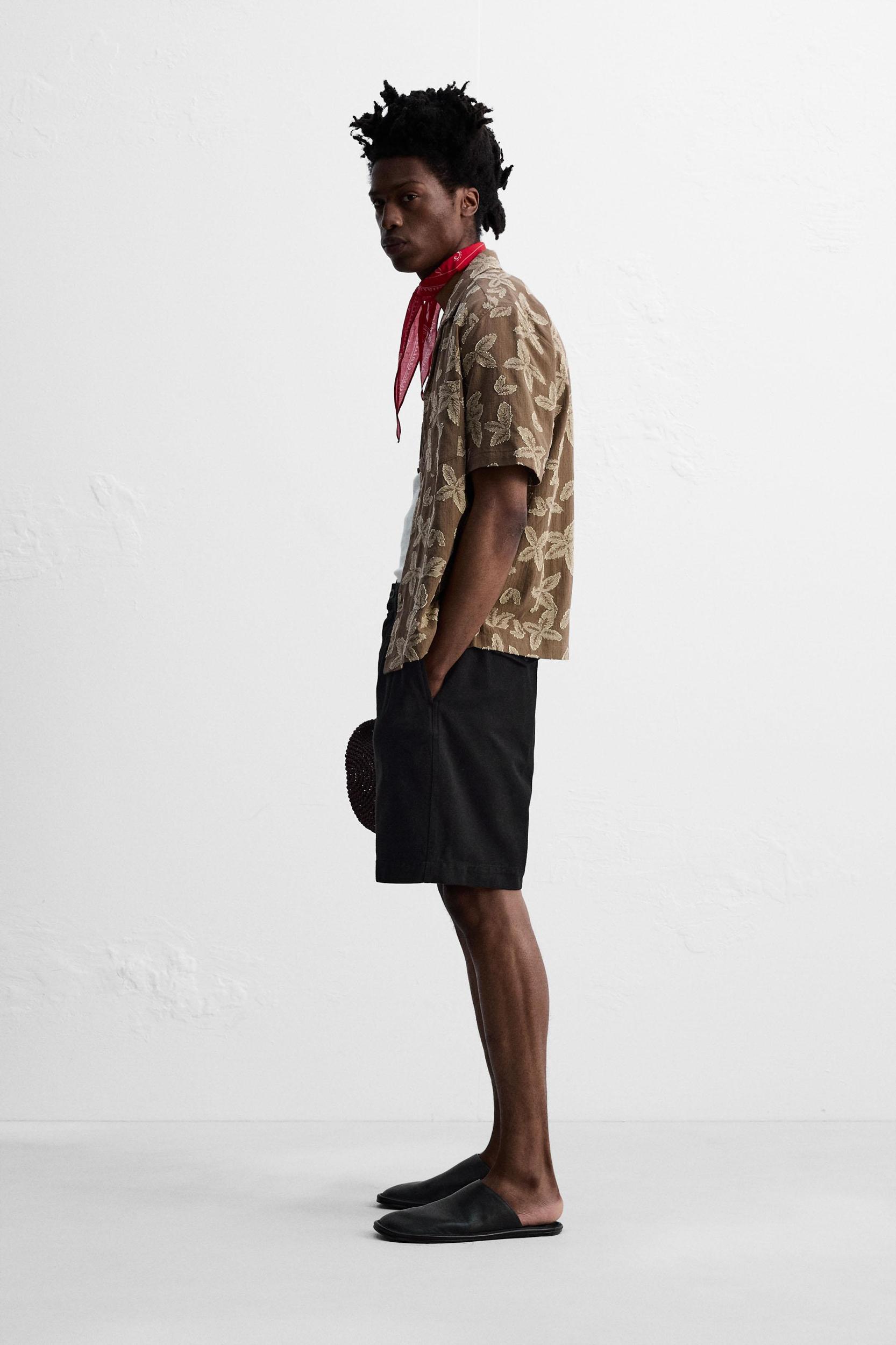 RELAXED FIT PLEATED BERMUDA SHORTS Product Image