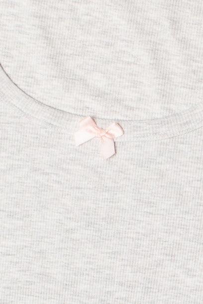 Layered Hem Bow Detail Long Sleeve Top Product Image