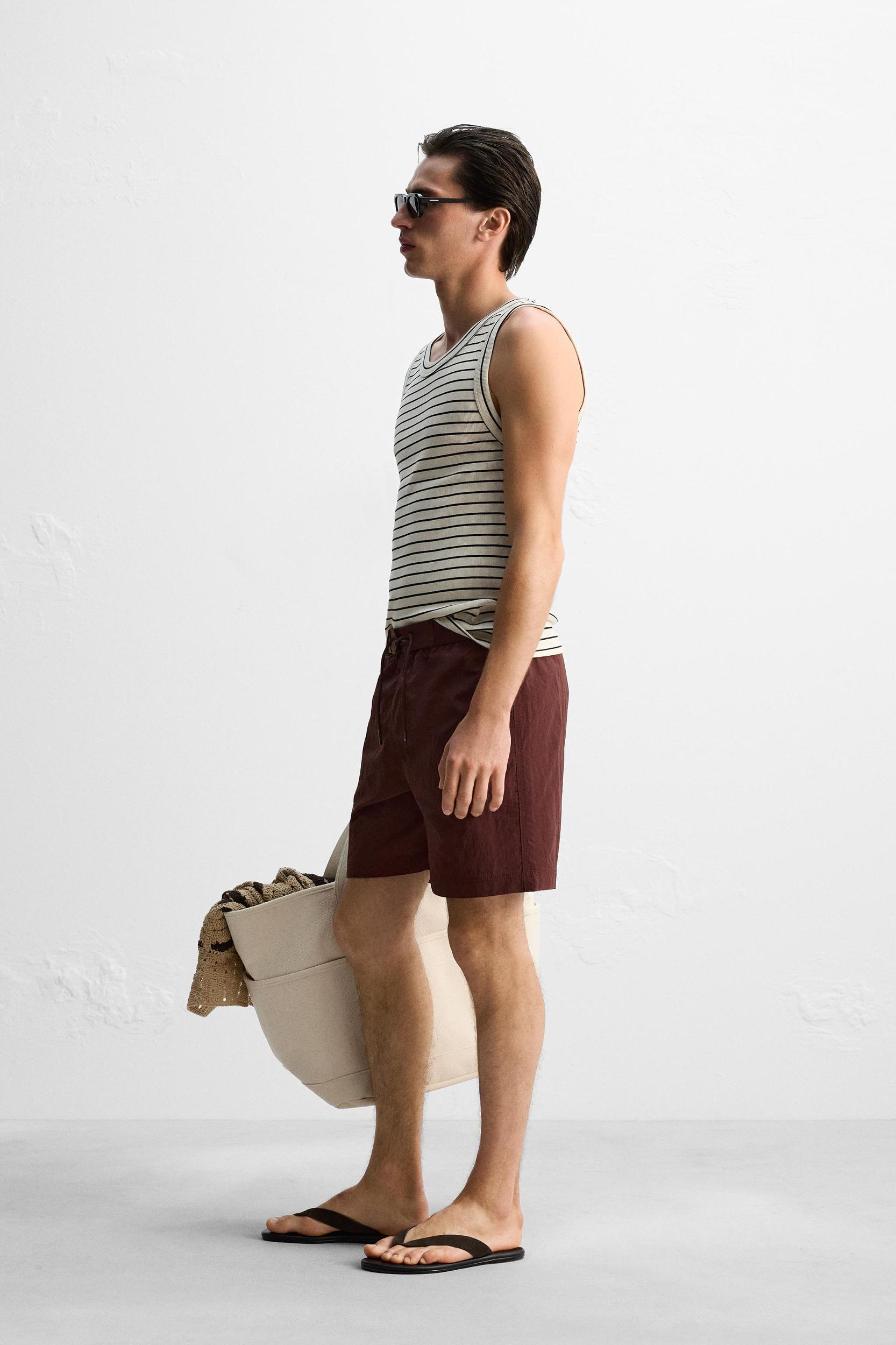 DRAWSTRING SWIM TRUNKS Product Image