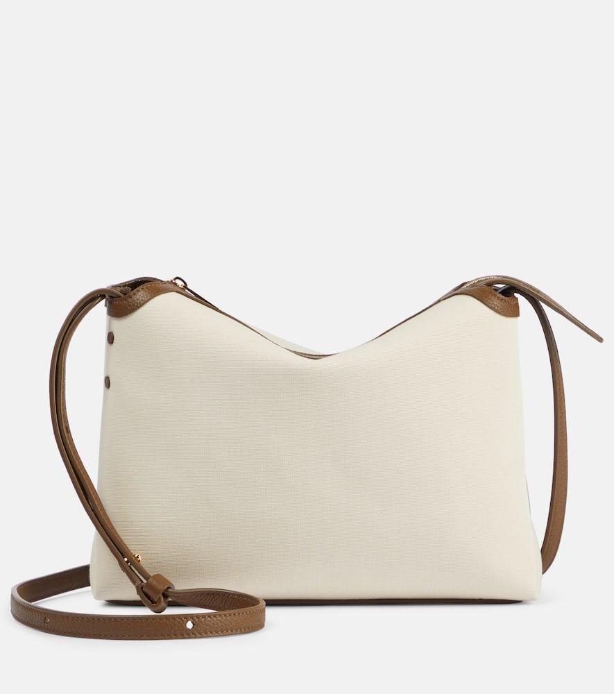 KHAITE Lina Leather-trimmed Canvas Crossbody Bag In Neutral Product Image