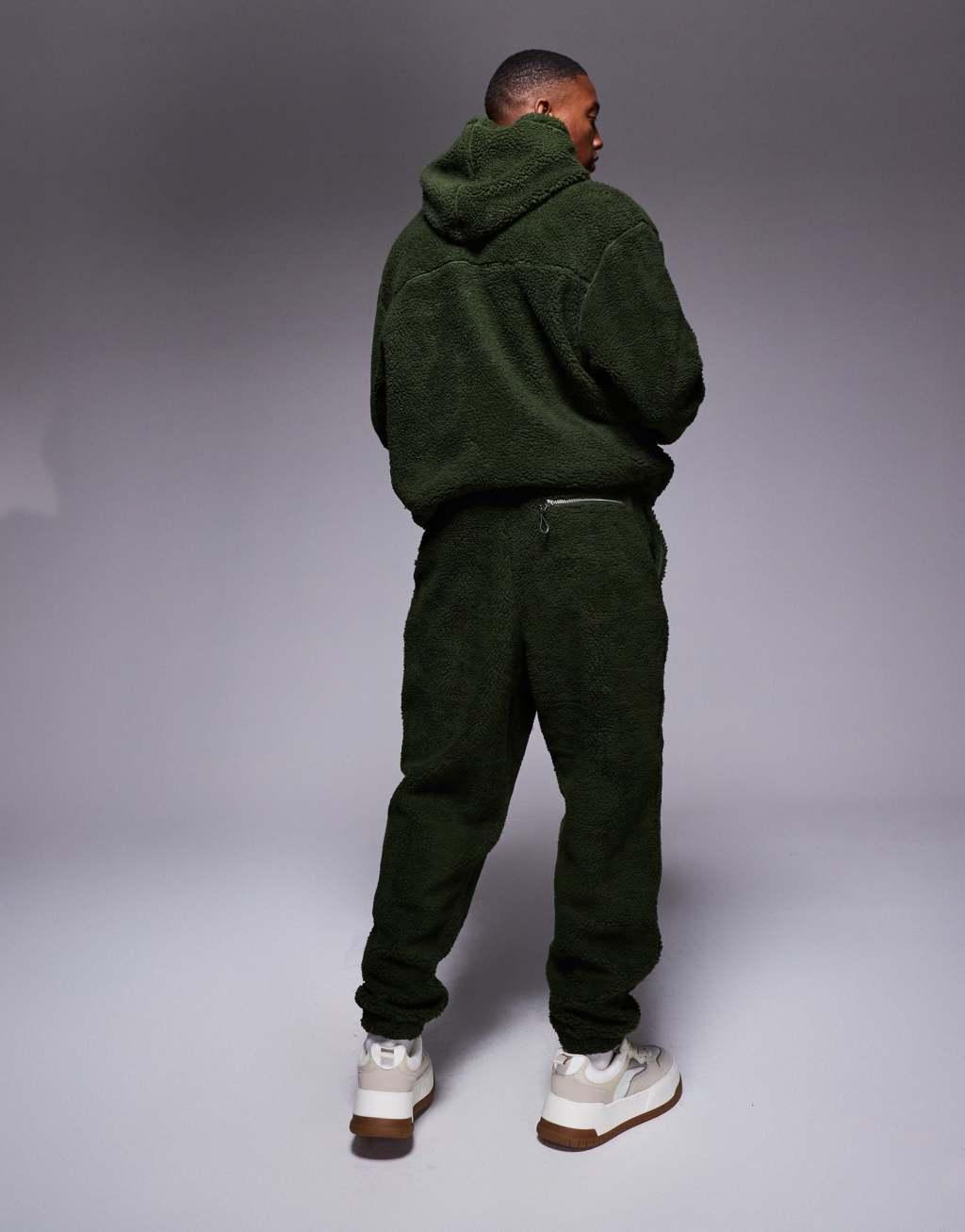 ASOS DESIGN oversized borg sweatpants in green Product Image