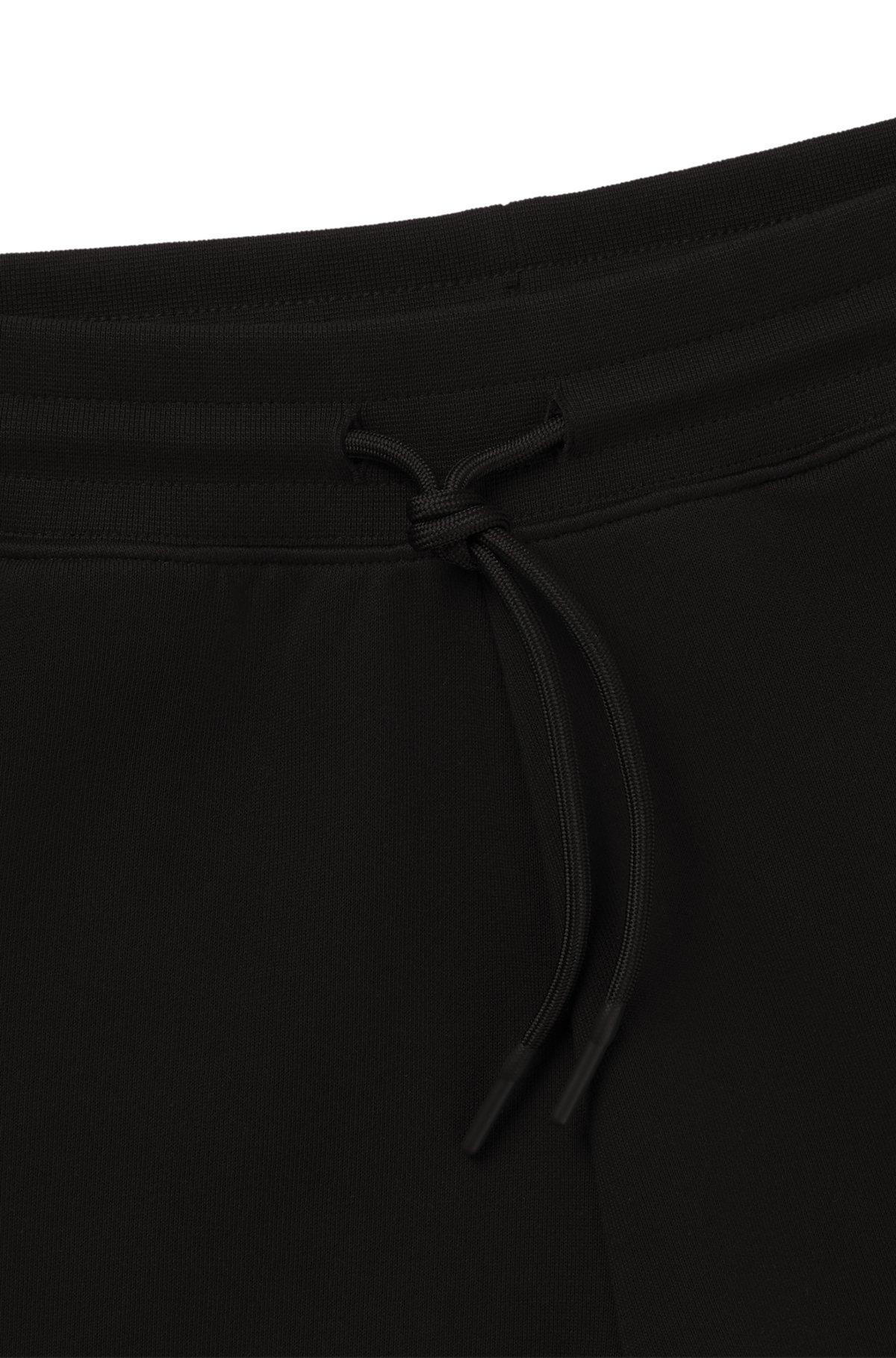 Cotton-terry shorts with Happy HUGO logo Product Image