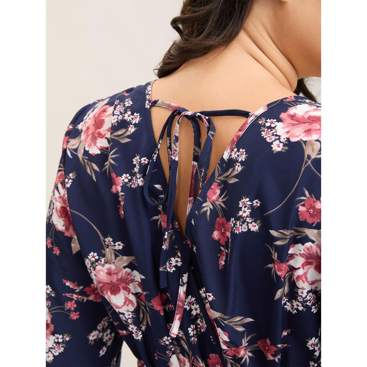 Plus Size DarkBlue Large Flower Pattern Pockets Belted Jumpsuit Women Elbow-length sleeve Overlap Collar Everyday-Elegant Loose Jumpsuits BloomChic 14-16/1X Product Image