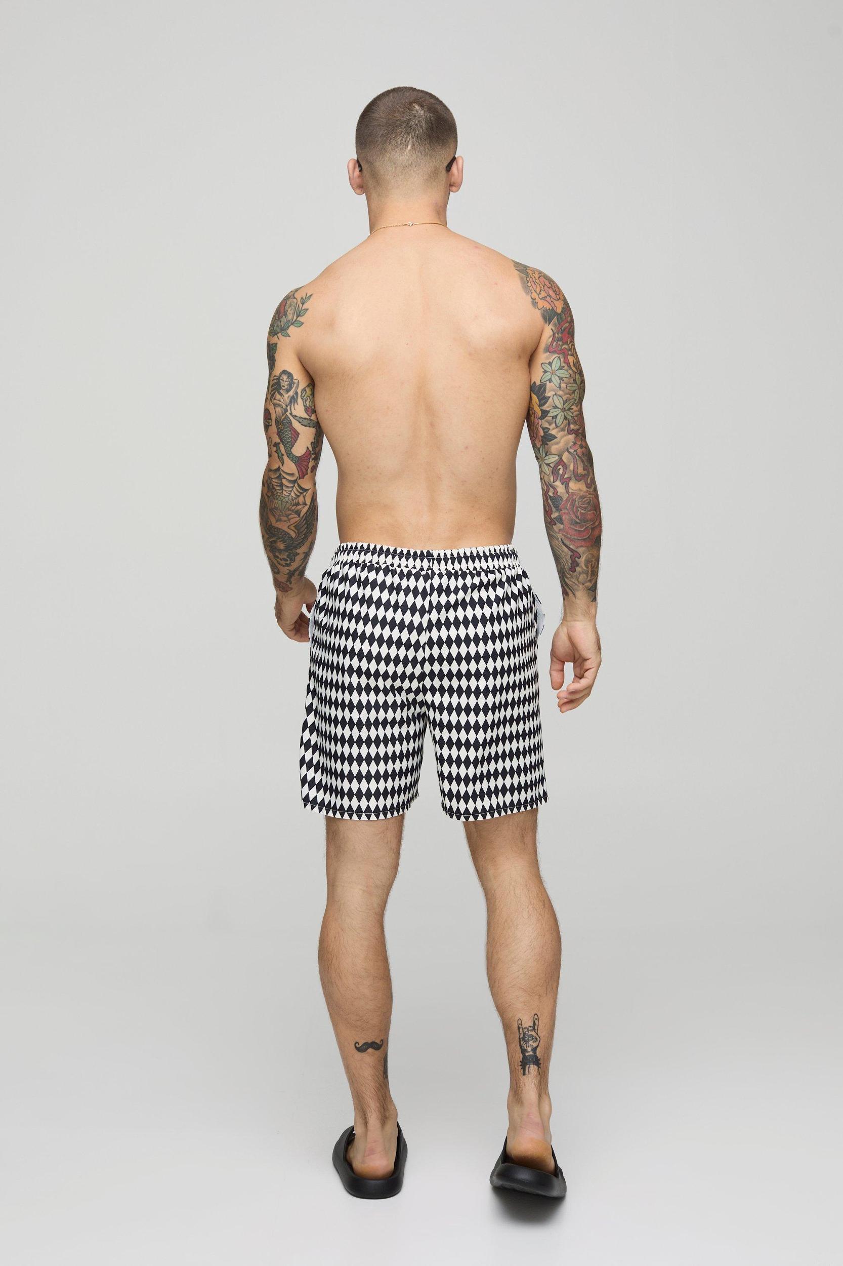 Mid Length Checker Print Swim Trunks | boohooMAN USA Product Image