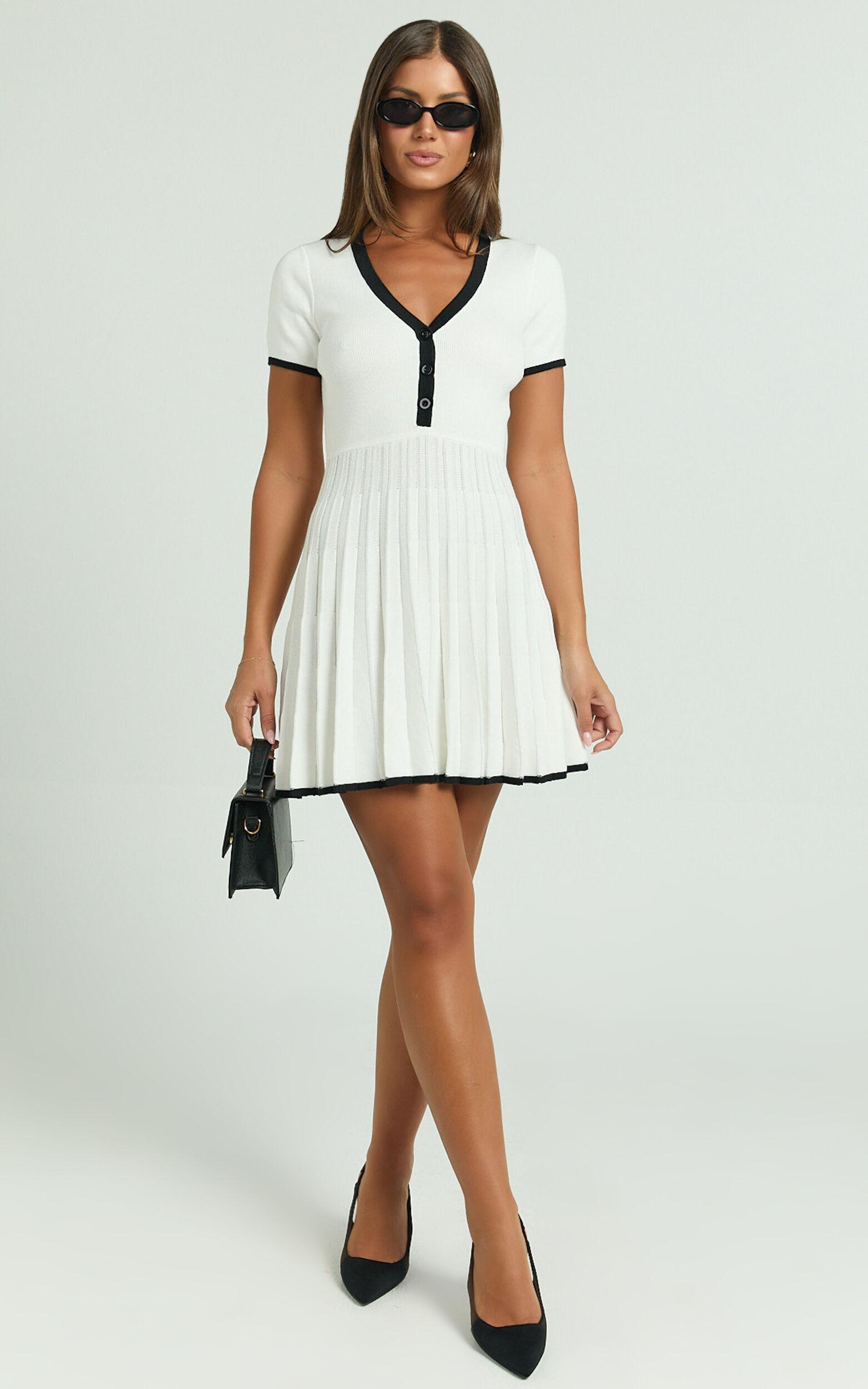 Vivienne Mini Dress - Short Sleeve Pleated Skirt Knitted Dress in Cream Product Image