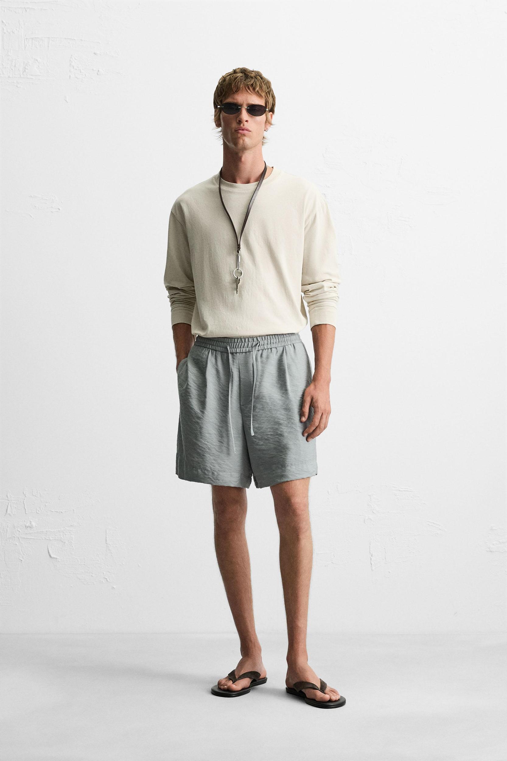 FLOWY RELAXED FIT BERMUDA SHORTS Product Image