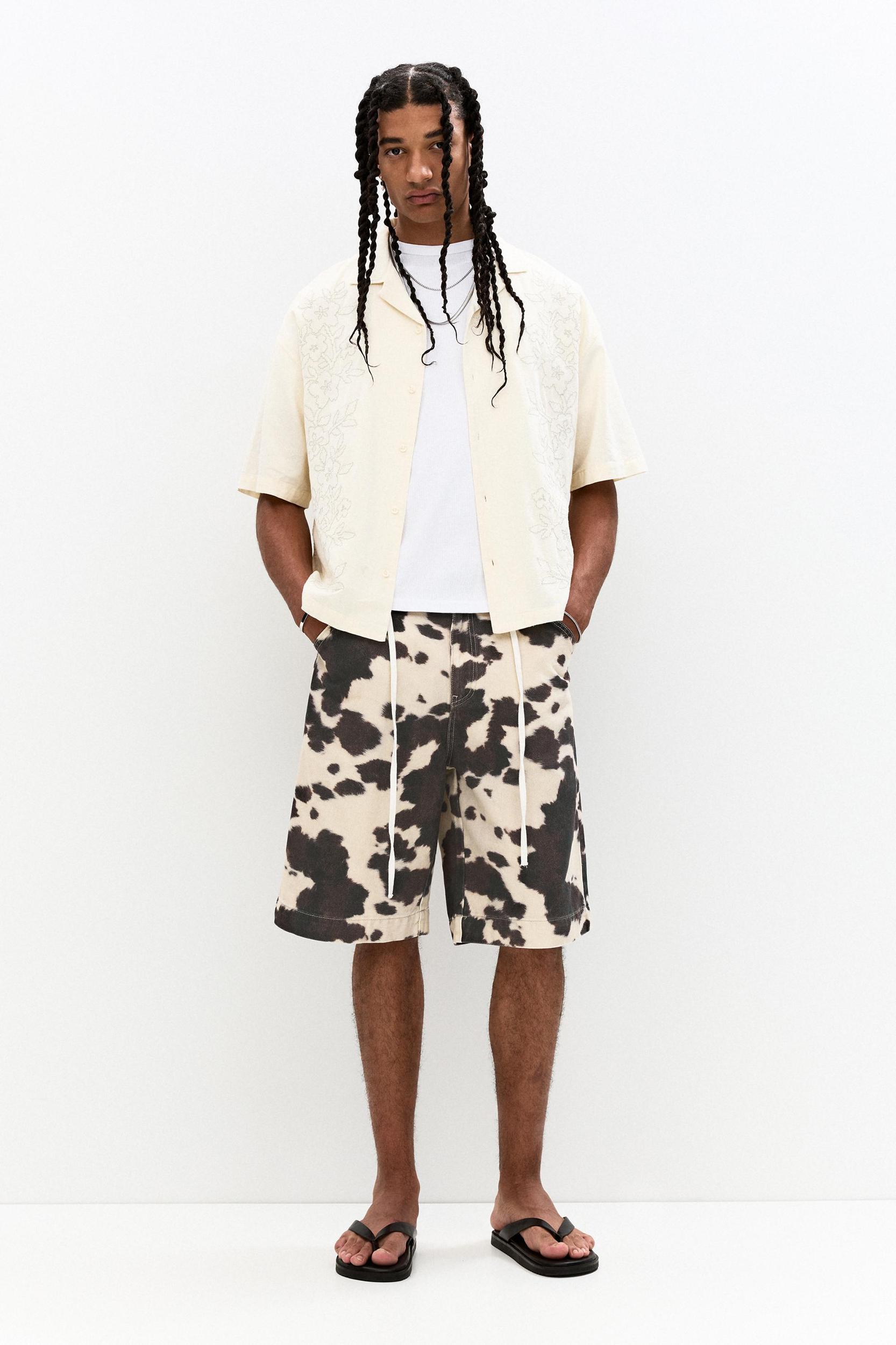 Animal print cow baggy Bermuda shorts Product Image